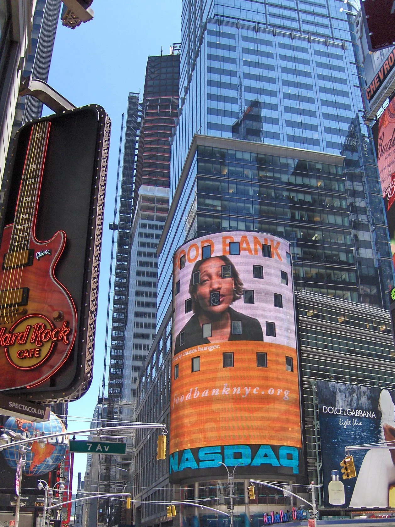 Where the Nathan’s Hotdog restaurant once stood, now features the iconic NASDAQ sign on 4 Times Square, which overlooks the new Times Square public plazas. Credit: The Durst Organization