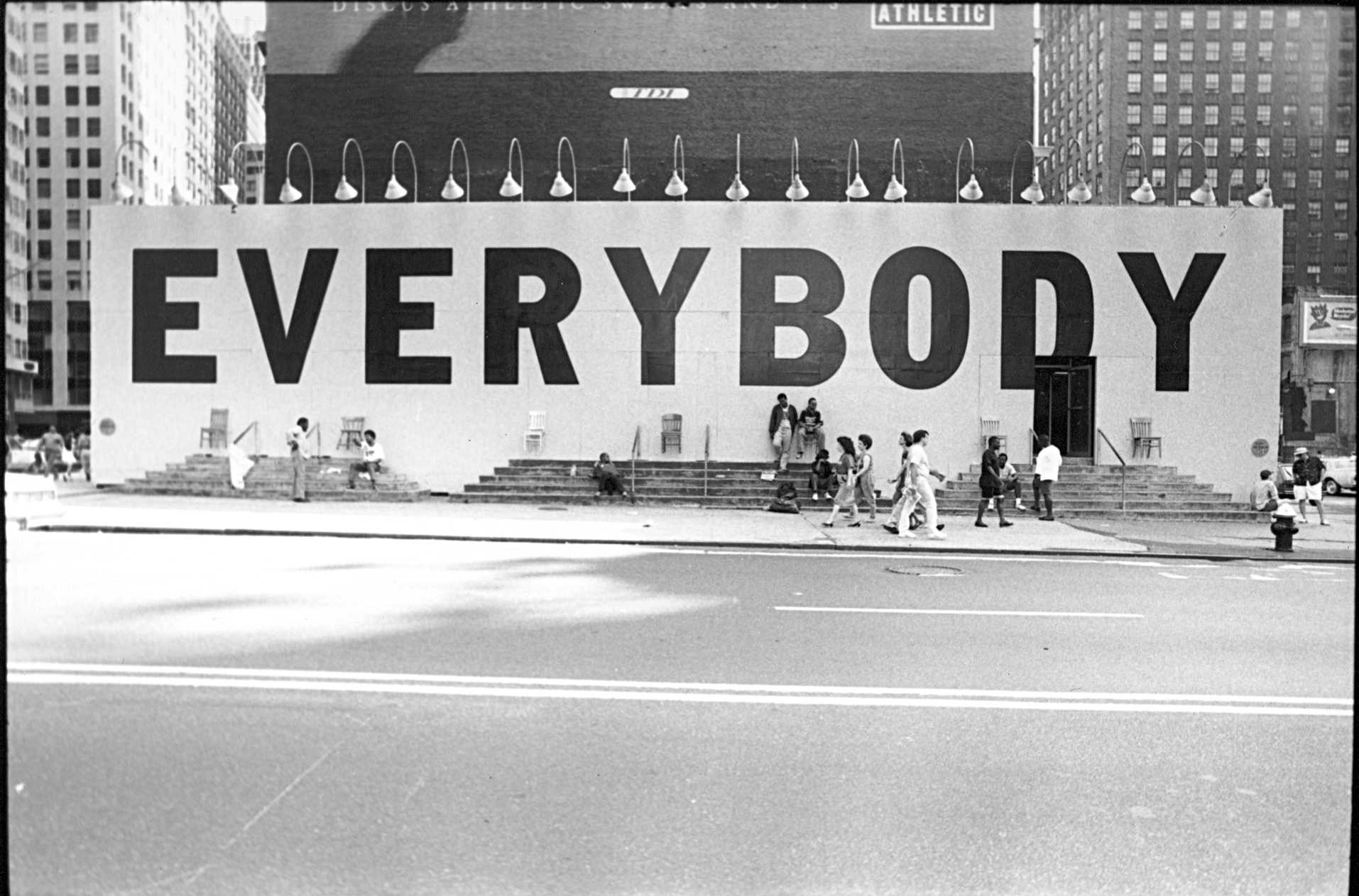 The famous “Everybody” billboard, designed by Tibor Kalman, that the 42nd Street Development project commissioned with Creative Time to bring people back to the block once the stores and buildings had been condemned. Credit: Maggie Hopp for Creative Time