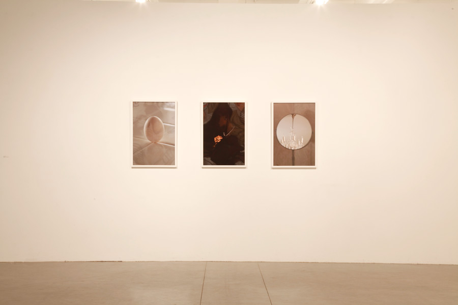 Installation view of Index (An Egg on its End, Diamonds and Pearls, Chandelier)