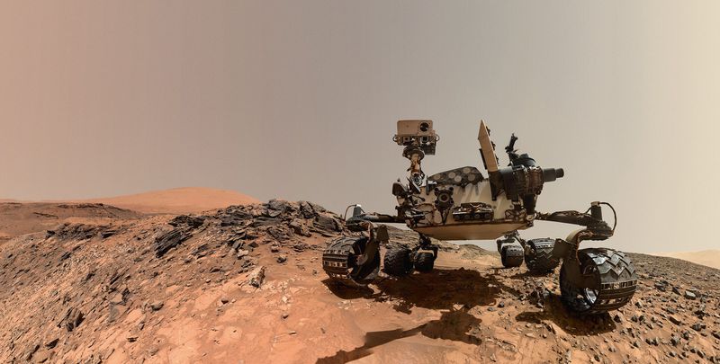 Curiosity made this self-portrait on Aug. 5, 2015, by maneuvering the Mars Hand Lens Imager (MAHLI) camera on the end of a seven-foot-long robotic arm. Multiple overlapping frames were acquired, then digitally stitched together by image analysts at JPL. (NASA)