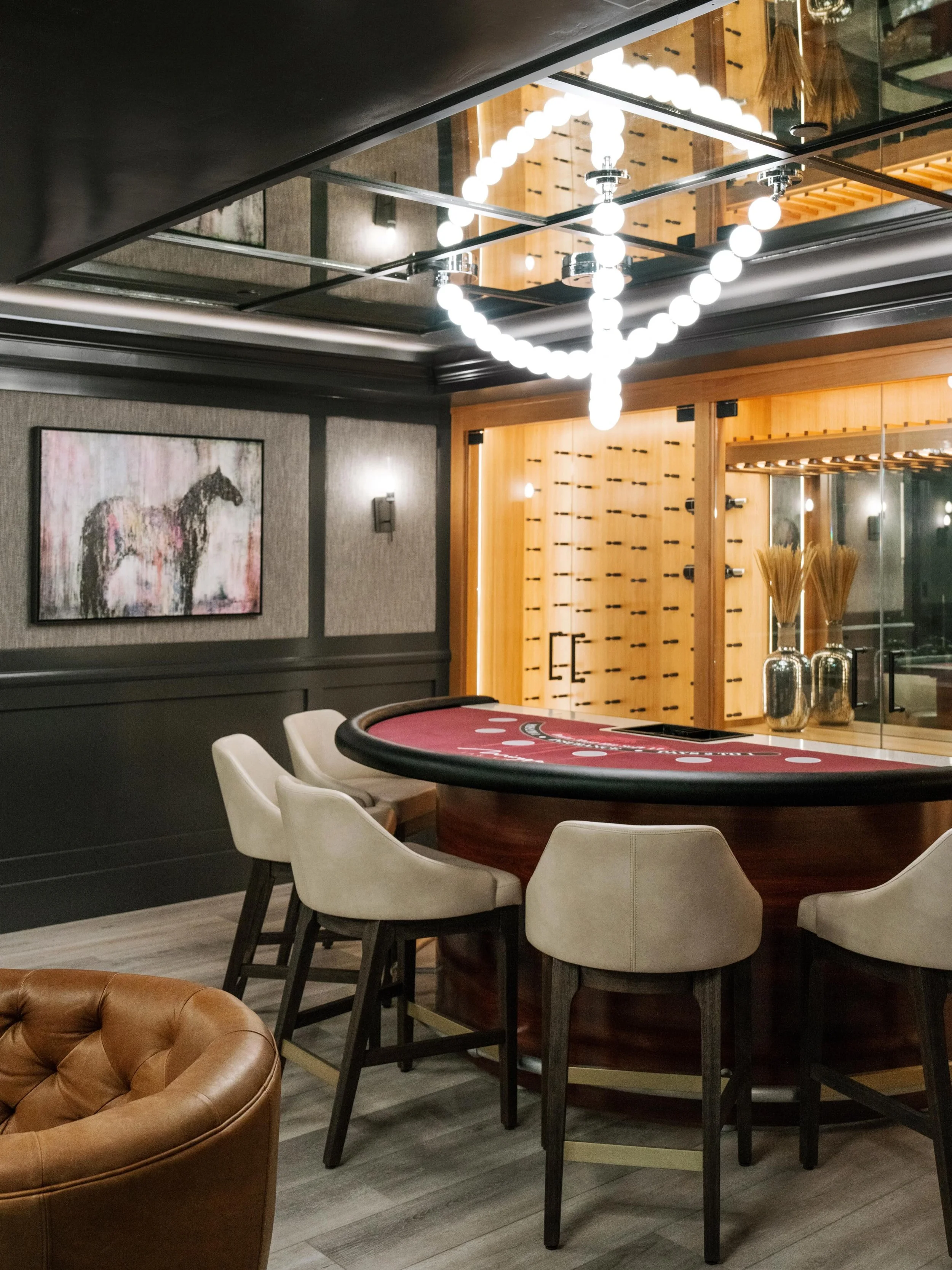 Sneak peek of a private game room, secretly tucked away behind cases of wine, ready to play.

#brockitecture #architecture #interiordesign

Photos @lisamaksoudian 
Art: GB Studios
Built: Odenwald Hand Built