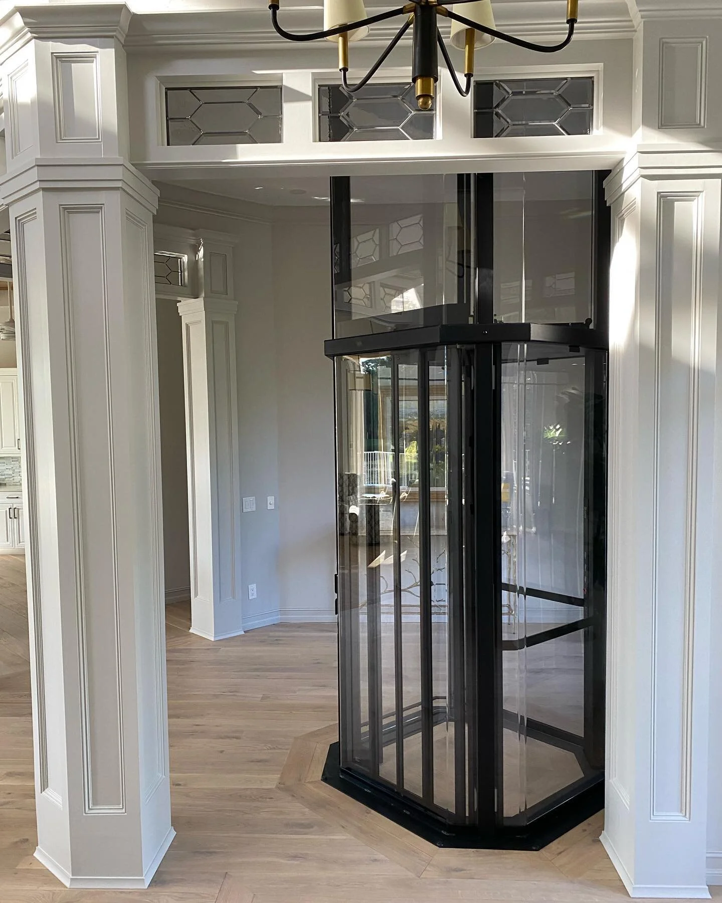 Custom column and transom details on a project in pelican bay