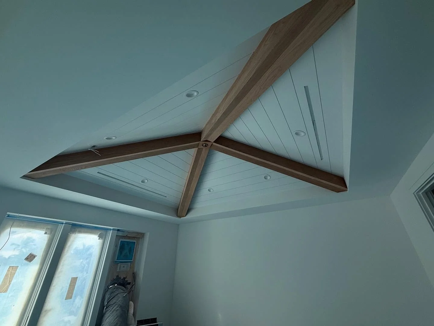 Nothing standard about these ceilings. Custom tongue and groove and beam details &mdash; built to bring character and craftsmanship to this Port Royal home. A project with @avabuilder 😀