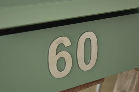 Stainless steel numbers in 75mm height.