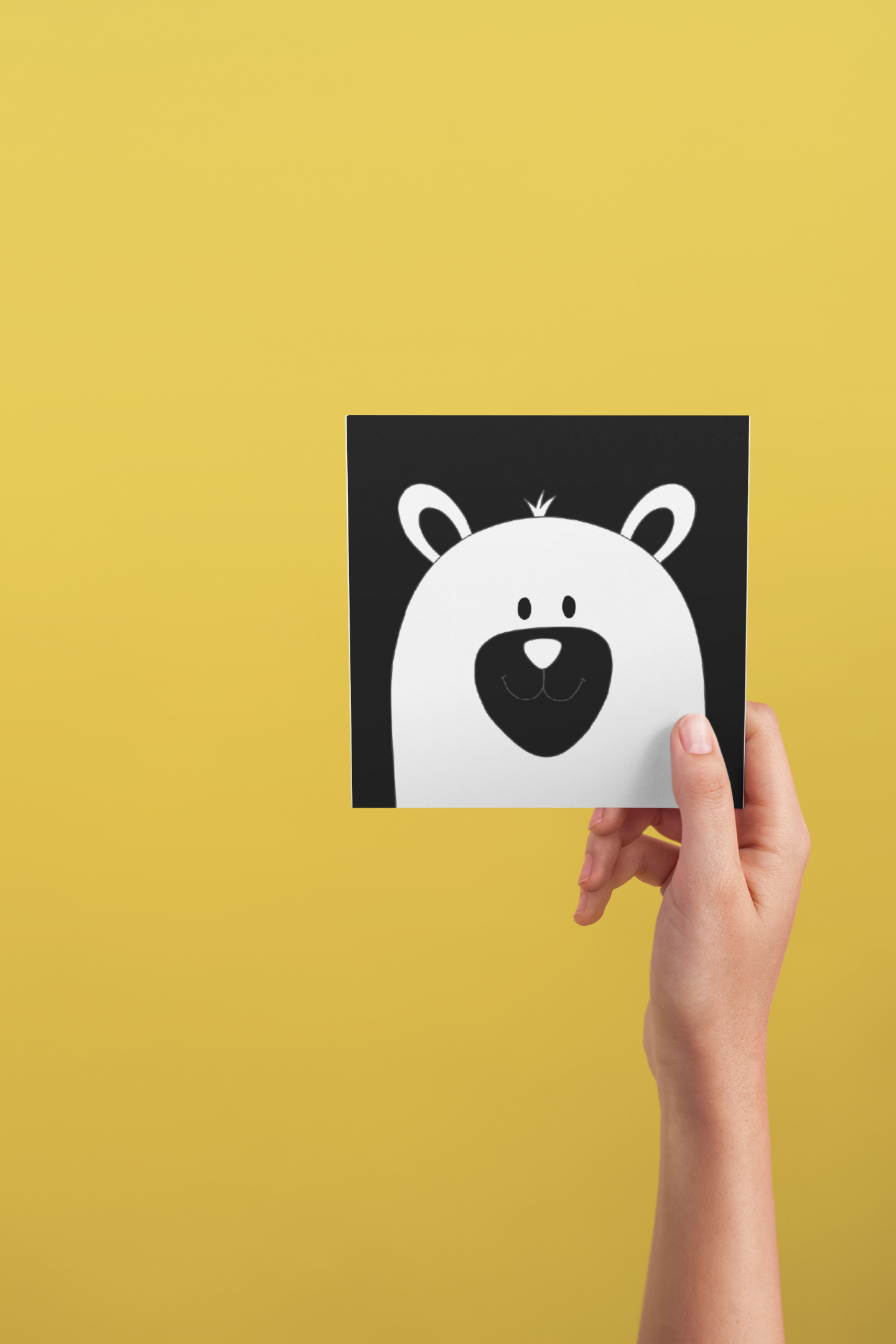 post-card-mockup-being-held-against-a-solid-color-background-a20554.png