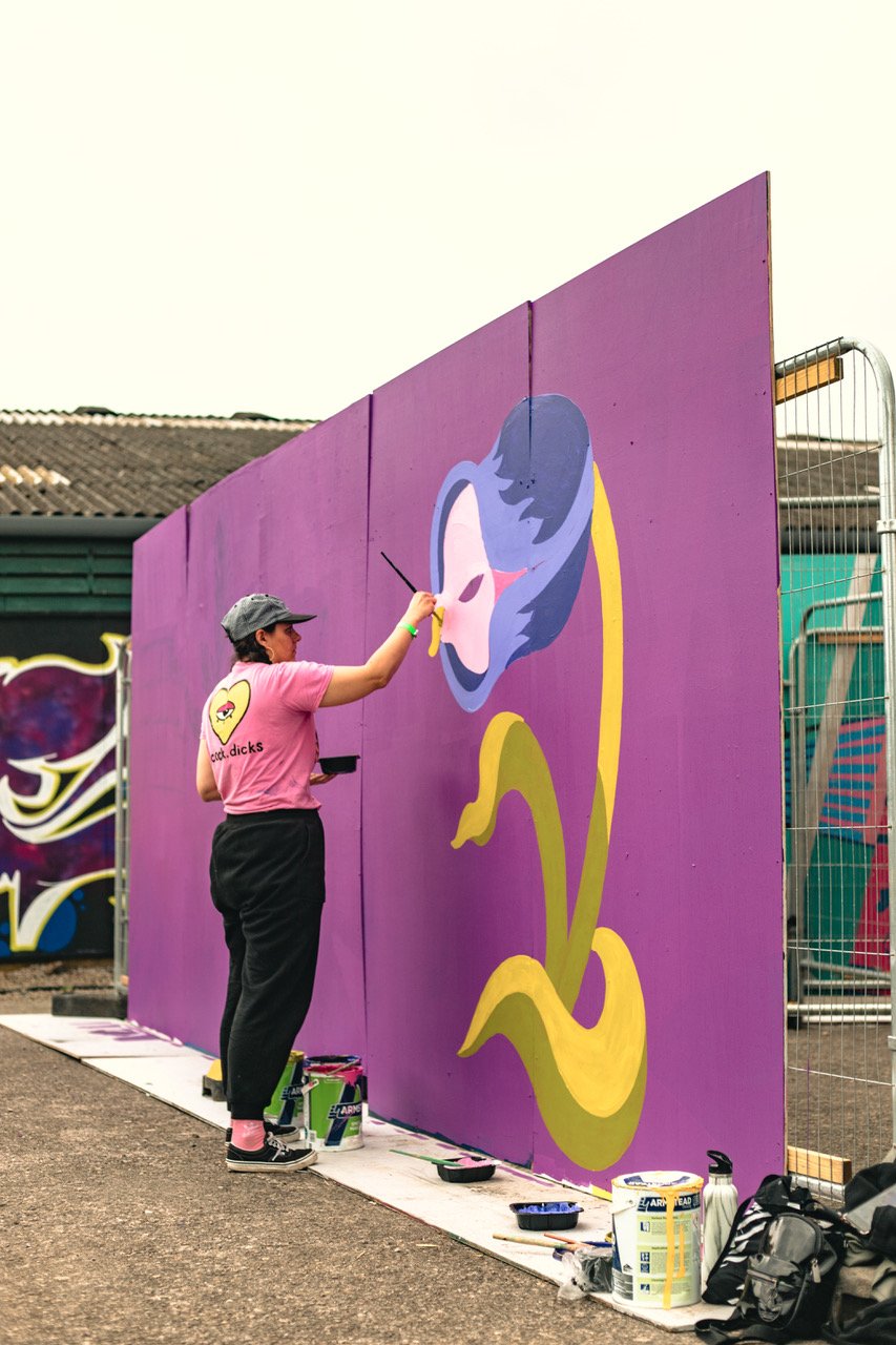 Artist Cock Dicks painting tuLIP mural