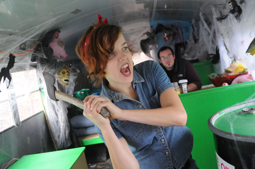 Alyssa Kowal, aka "Rosie the Riveter," wields an axe