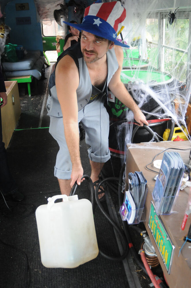Derek transfers veggie oil into a container