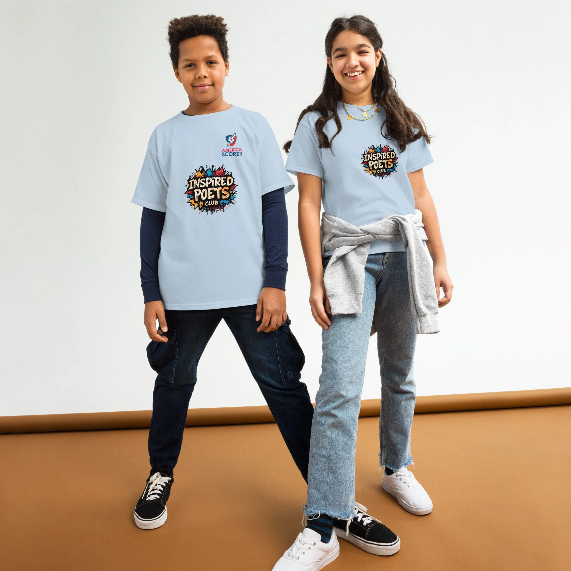 youth-classic-tee-light-blue-front-6938a16f6df08.jpg