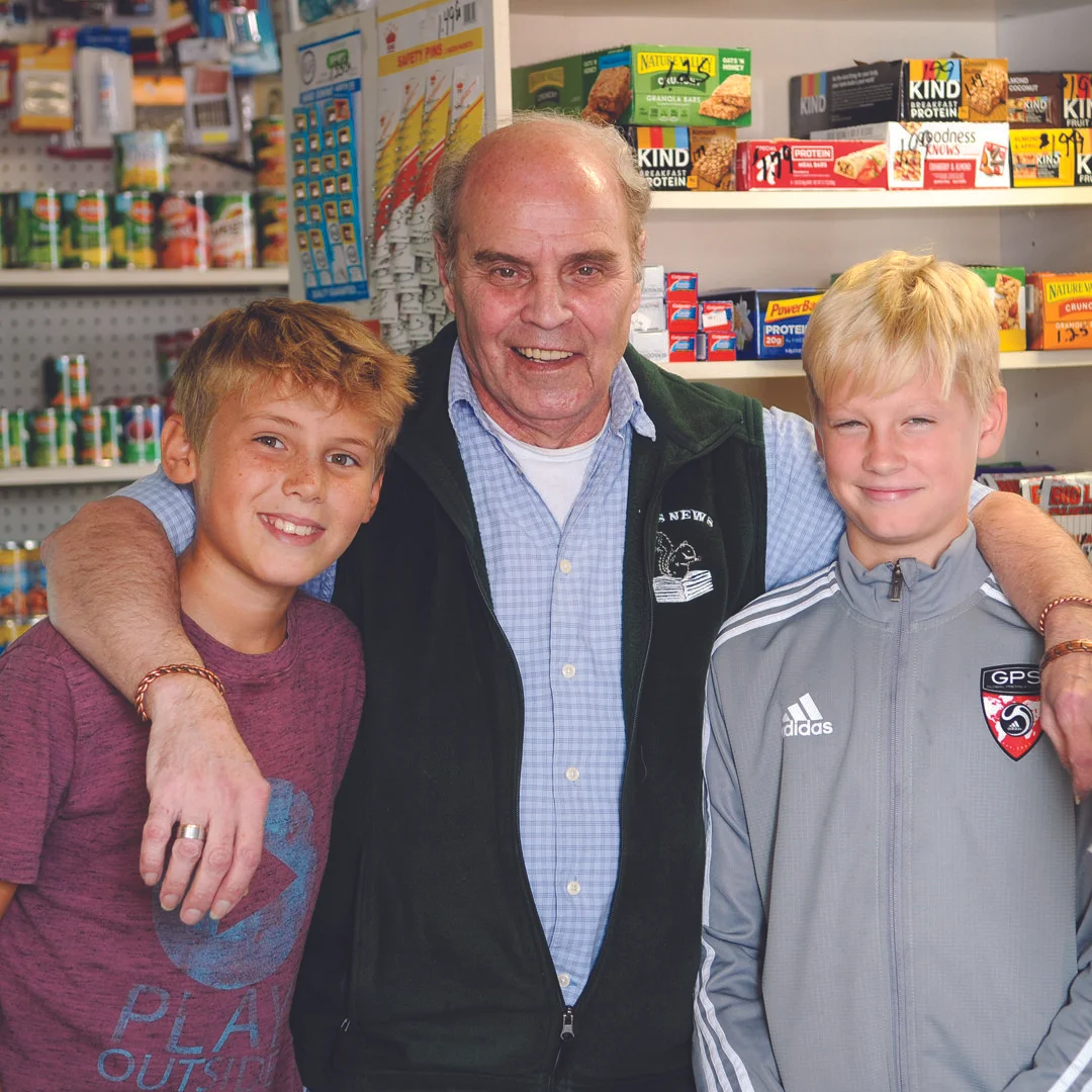 Tom with loyal customers Leo Fowler (left) and Maclan Griscom (right).