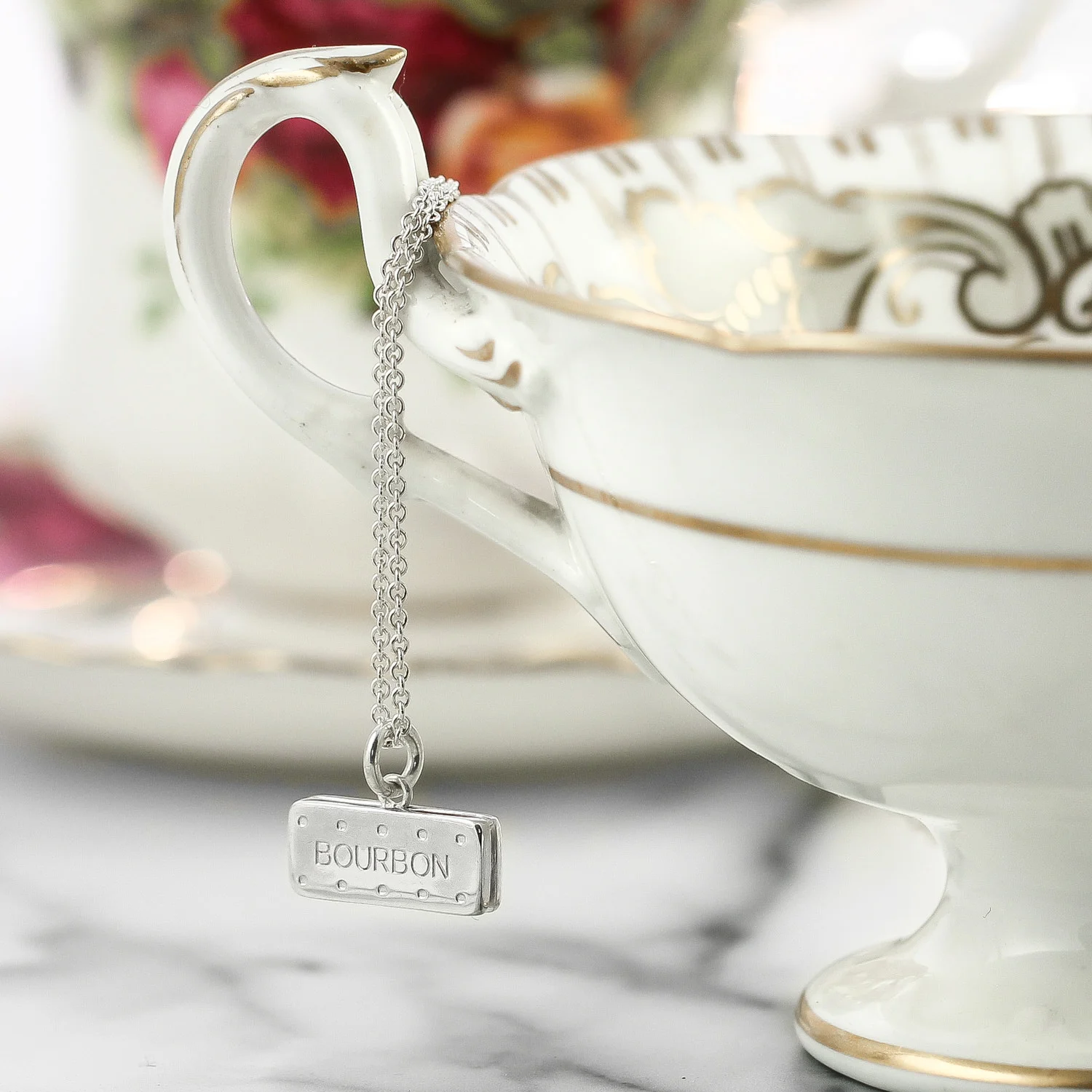Sterling-silver-bourbon-biscuit-charm-necklace-lifestyle-photo.JPG