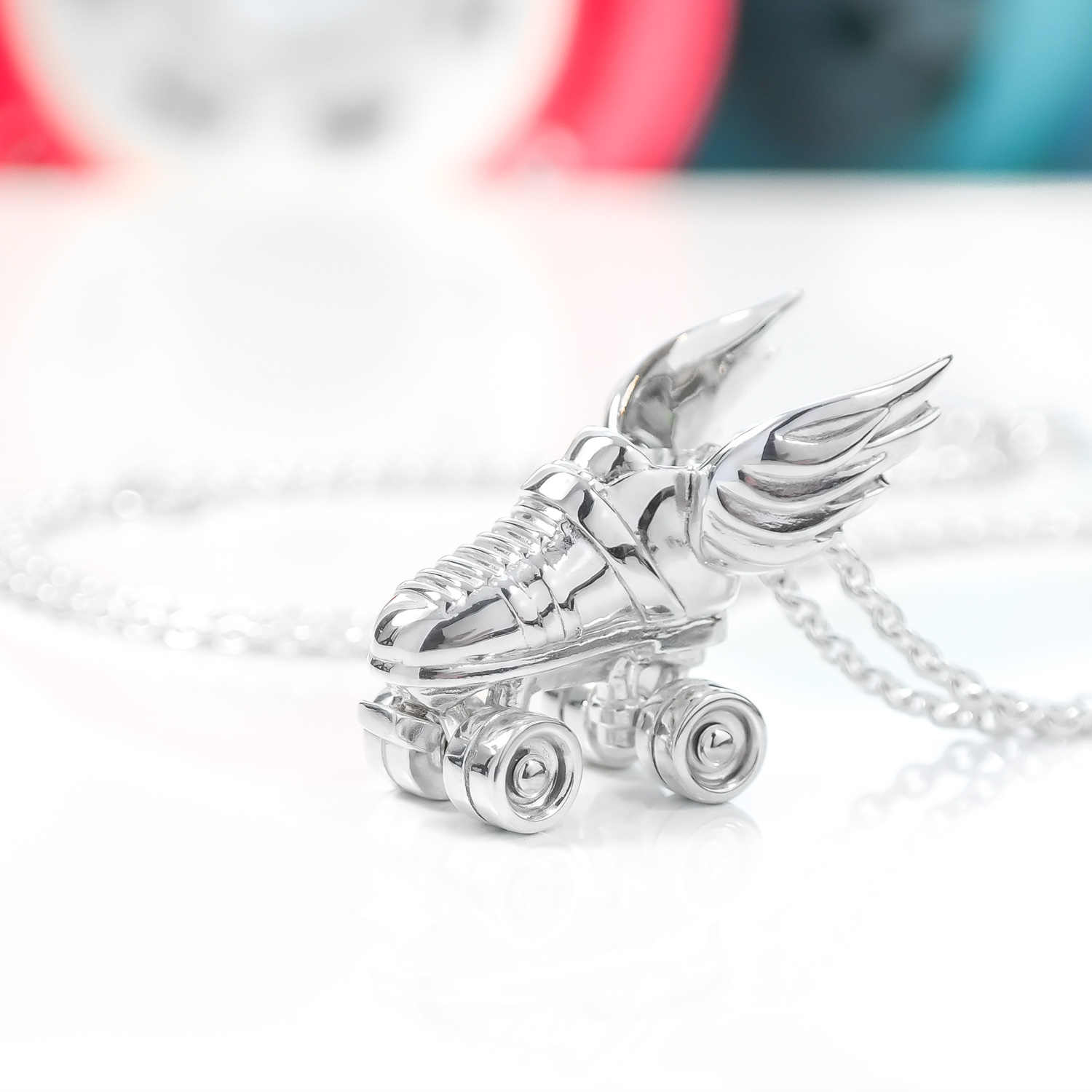 Sterling-silver-handmade-winged-roller-derby-winged-skate-necklace-3.JPG