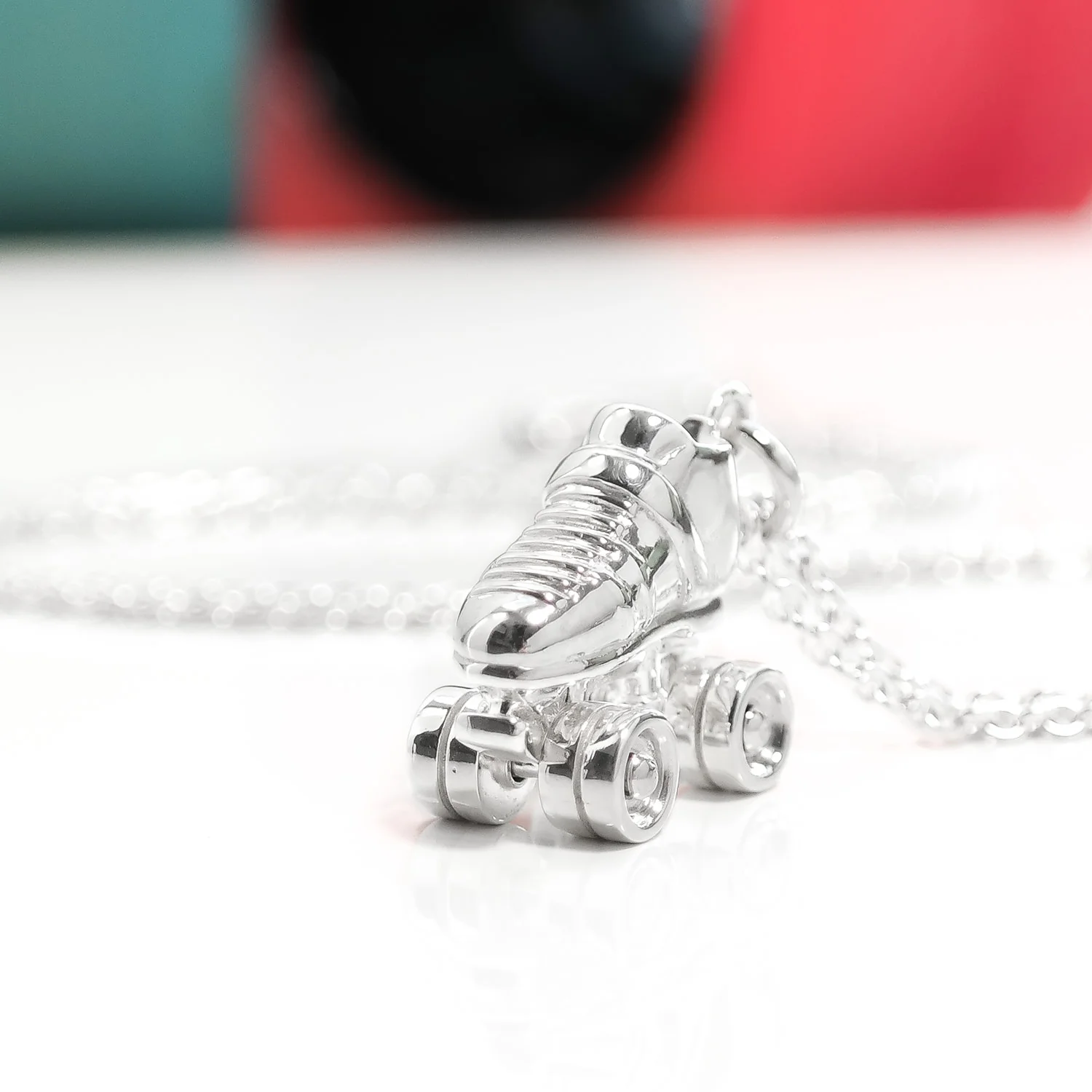 Sterling-silver-roller-derby-skate-necklace.JPG