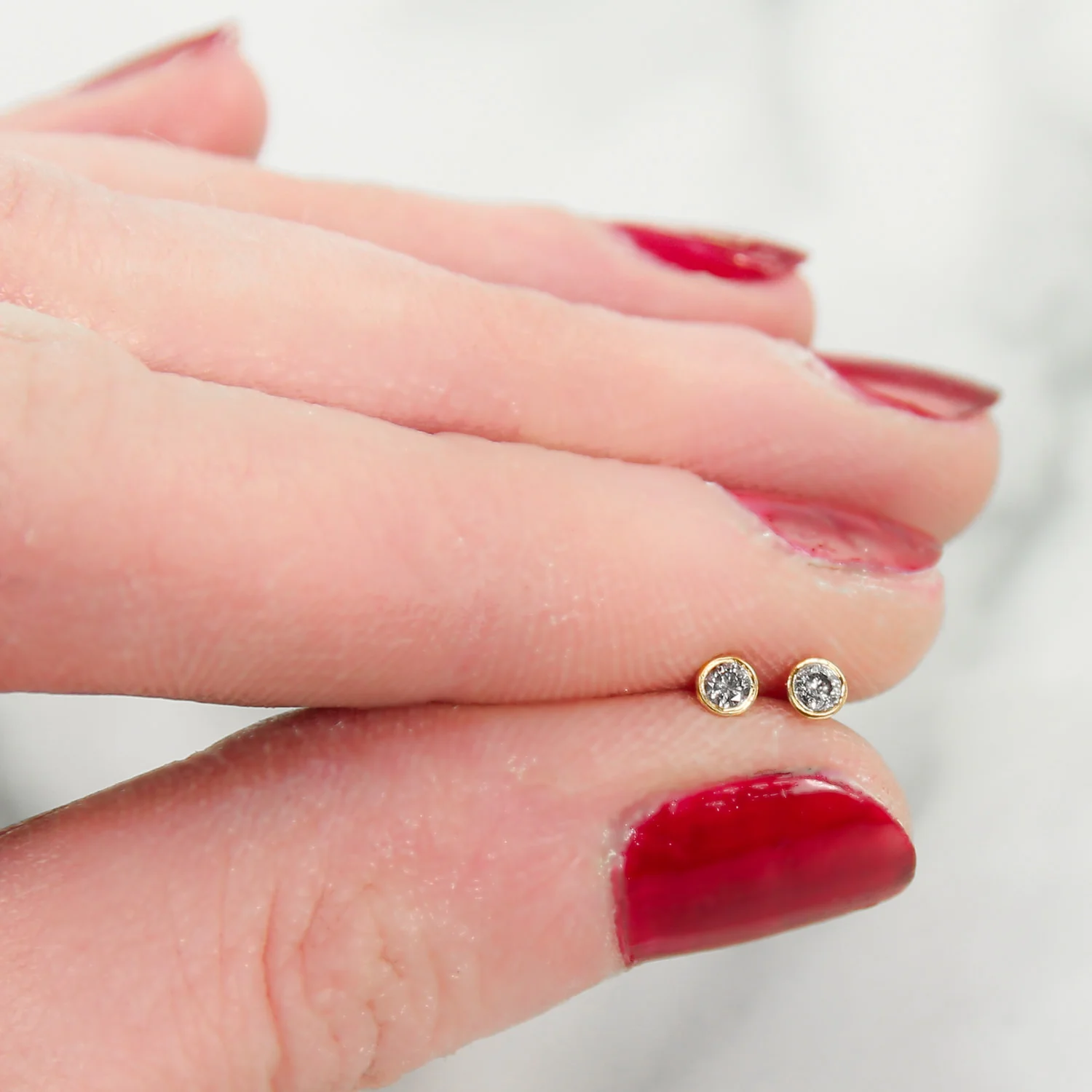 Tiny salt and pepper diamond stud earrings ethically handmade