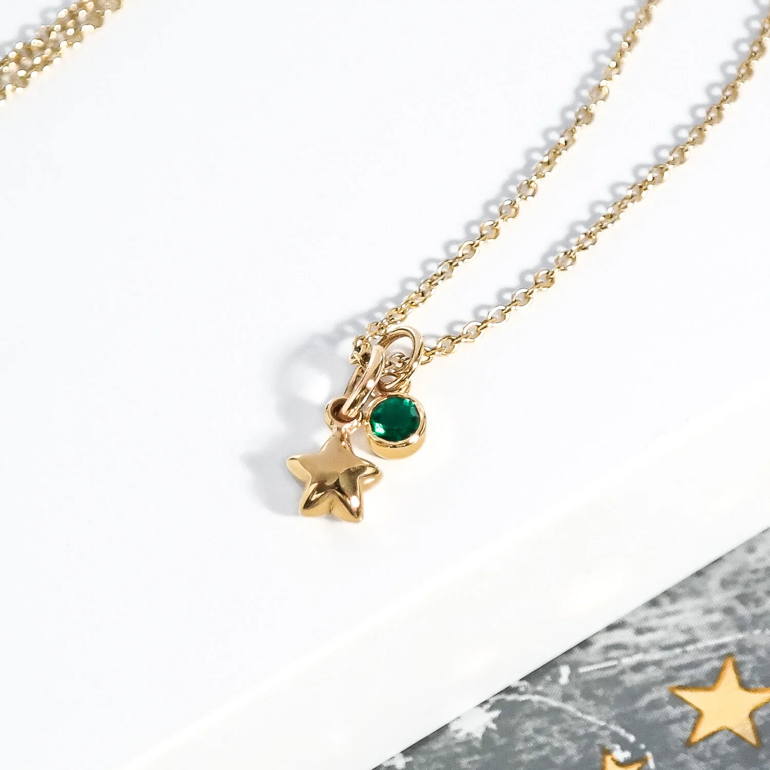 Solid-eco-recycled-gold-tiny-star-emerald-necklace-ethical.jpg