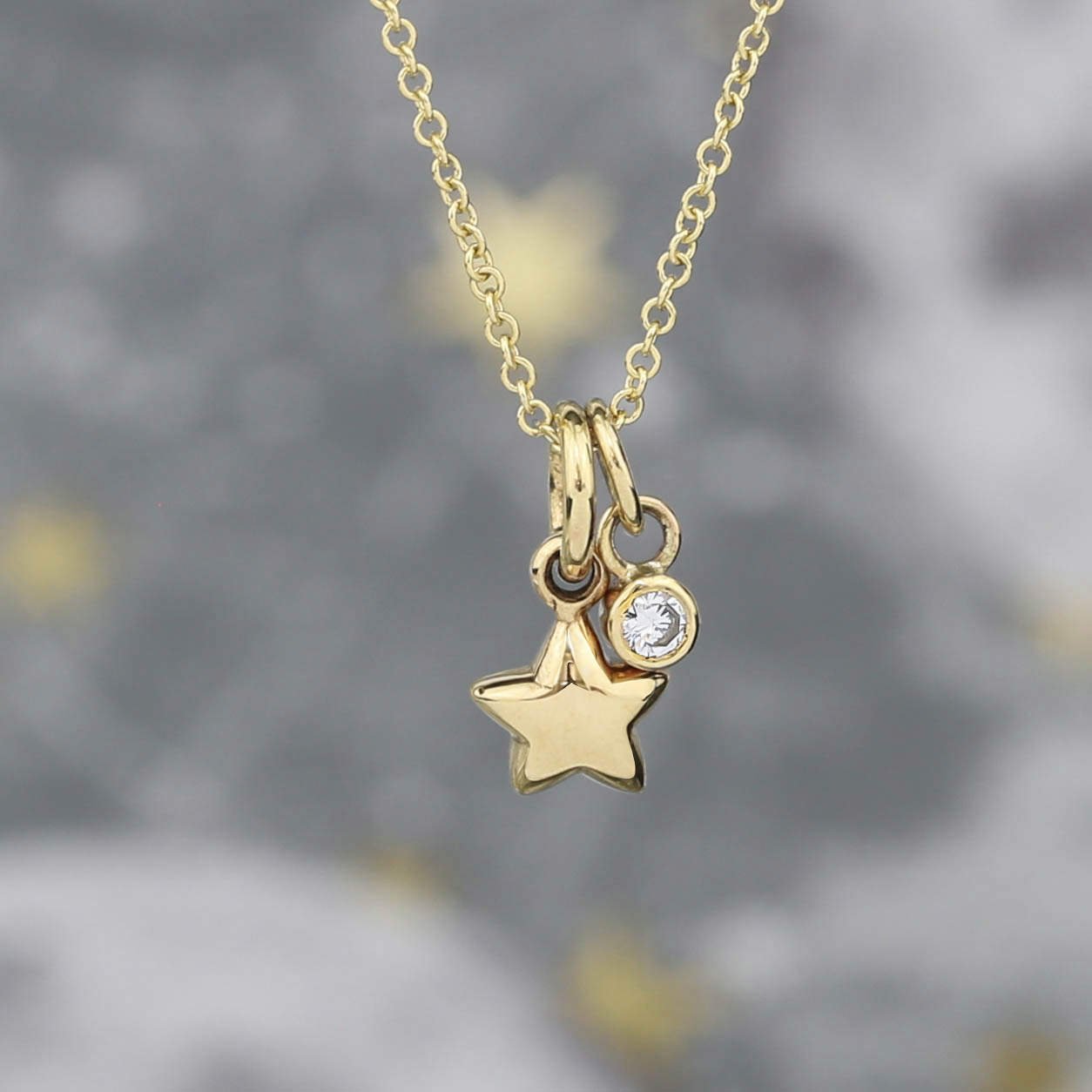 9ct-solid-eco-recycled-gold-tiny-star-necklace.jpg