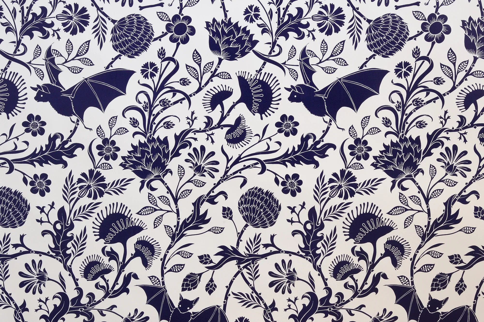 Bat and carnivorous plant wallpaper in navy blue with white background