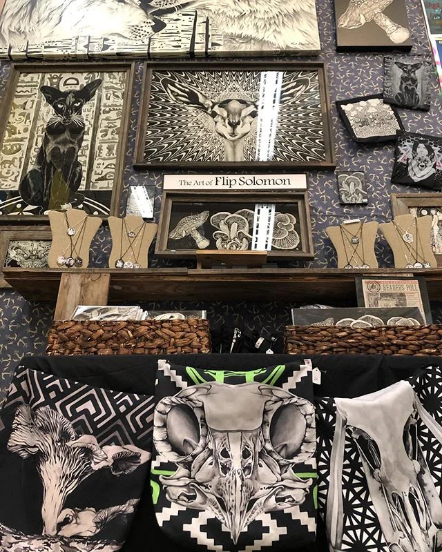 🧞&zwj;♂️ Blue Genie is open for business❣️ I&rsquo;m in the sweet-spot back corner 💖 in between the poster art of @nakatomi_inc ⚔️ and illustrative works of  @brianmaclaskey 🦈 Back wall neighbors include @grahambunctious 🐻 @therobotsinrowboats 🤖