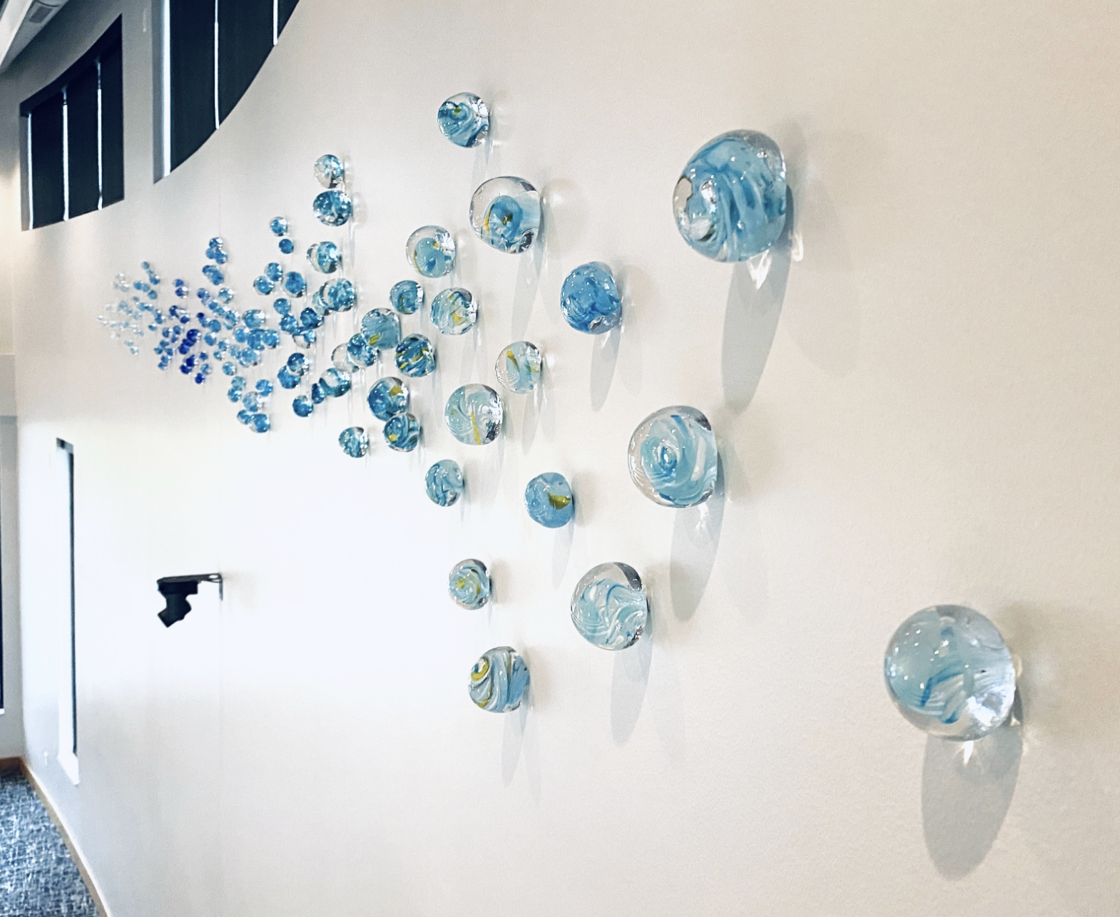 Jodi_Reeb_GlassOrbsInstallation.png