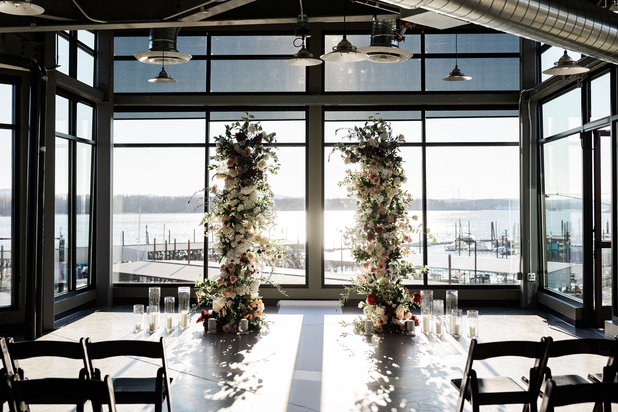 floral columns stand in front of large windows at the black pearl on the columbia
