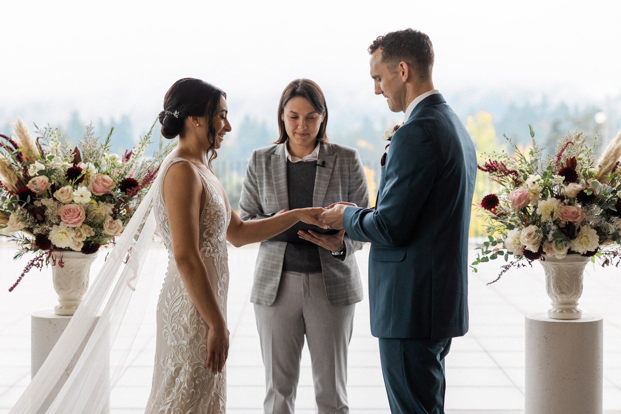 bride and groom exchange rings at ironlight wedding venue in lake oswego, oregon