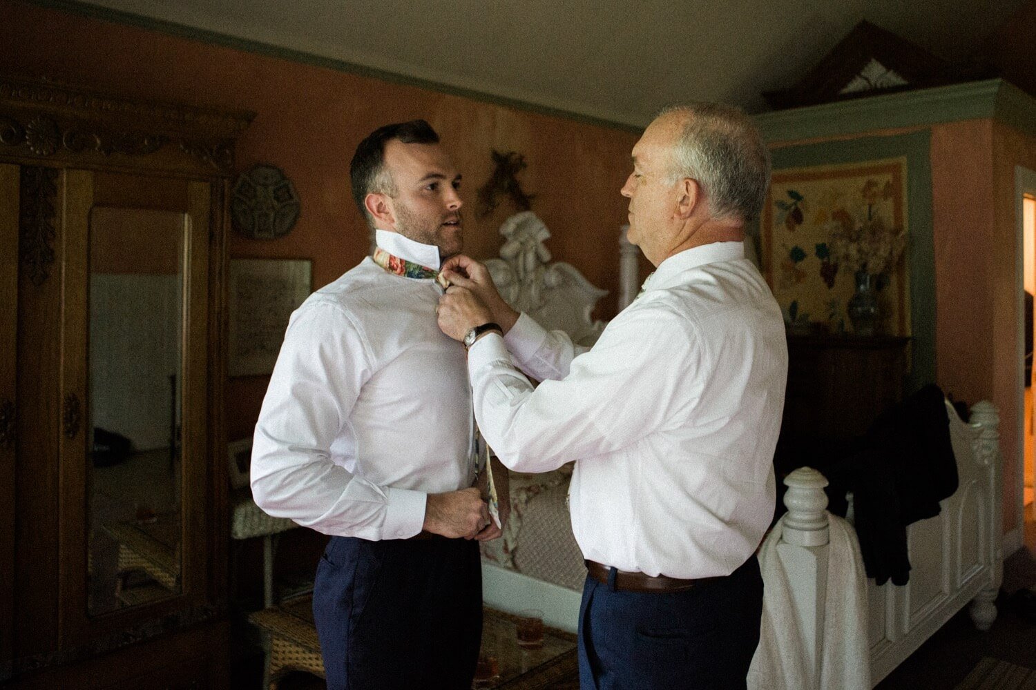 019_Mount Hood Organic Farms Wedding-9133_Dad helps groom put on tie.jpg