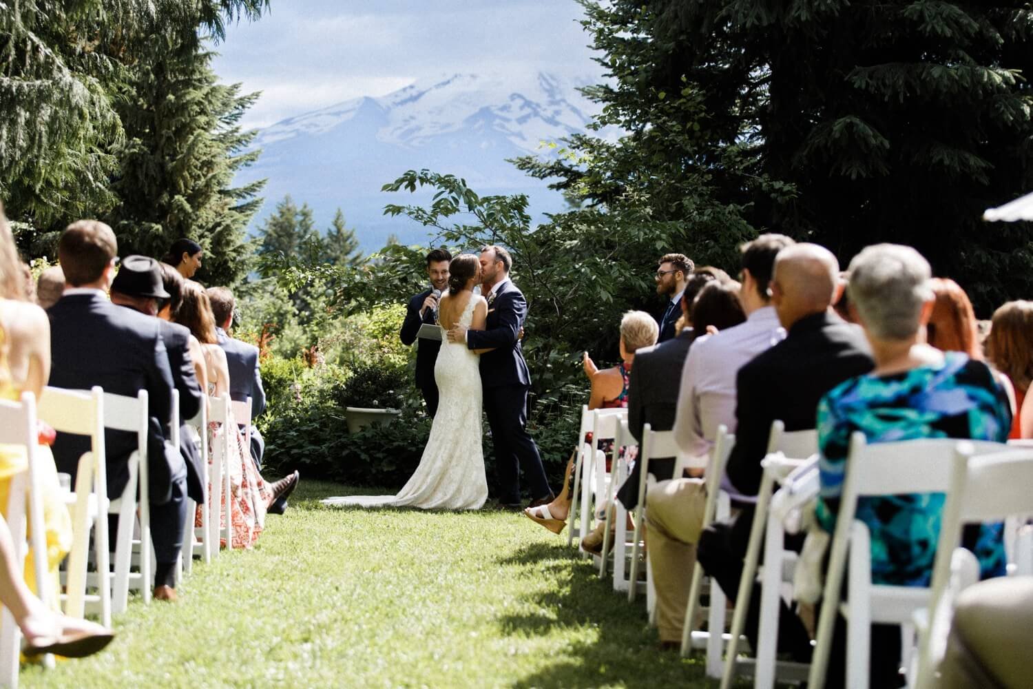 063_Mount Hood Organic Farms Wedding-Bride and groom kiss after ceremony.jpg