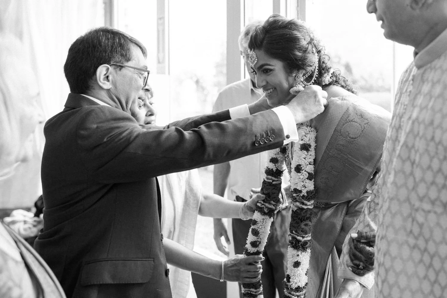 039_Oregon Golf Club Indian Wedding-118_family members place mala on bride before wedding ceremony.jpg