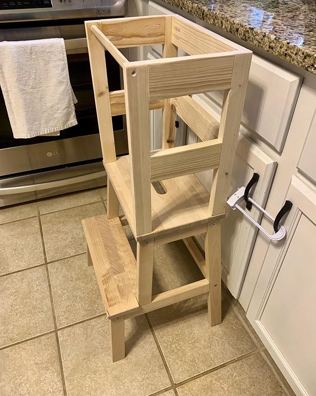 Our 18 month old has started carrying her little footstool into the kitchen to try and reach the countertop. So, for a quick fix before thanksgiving, we ran to IKEA, bought a stool and I turned it into a learning tower in about 90 minutes...paint wil