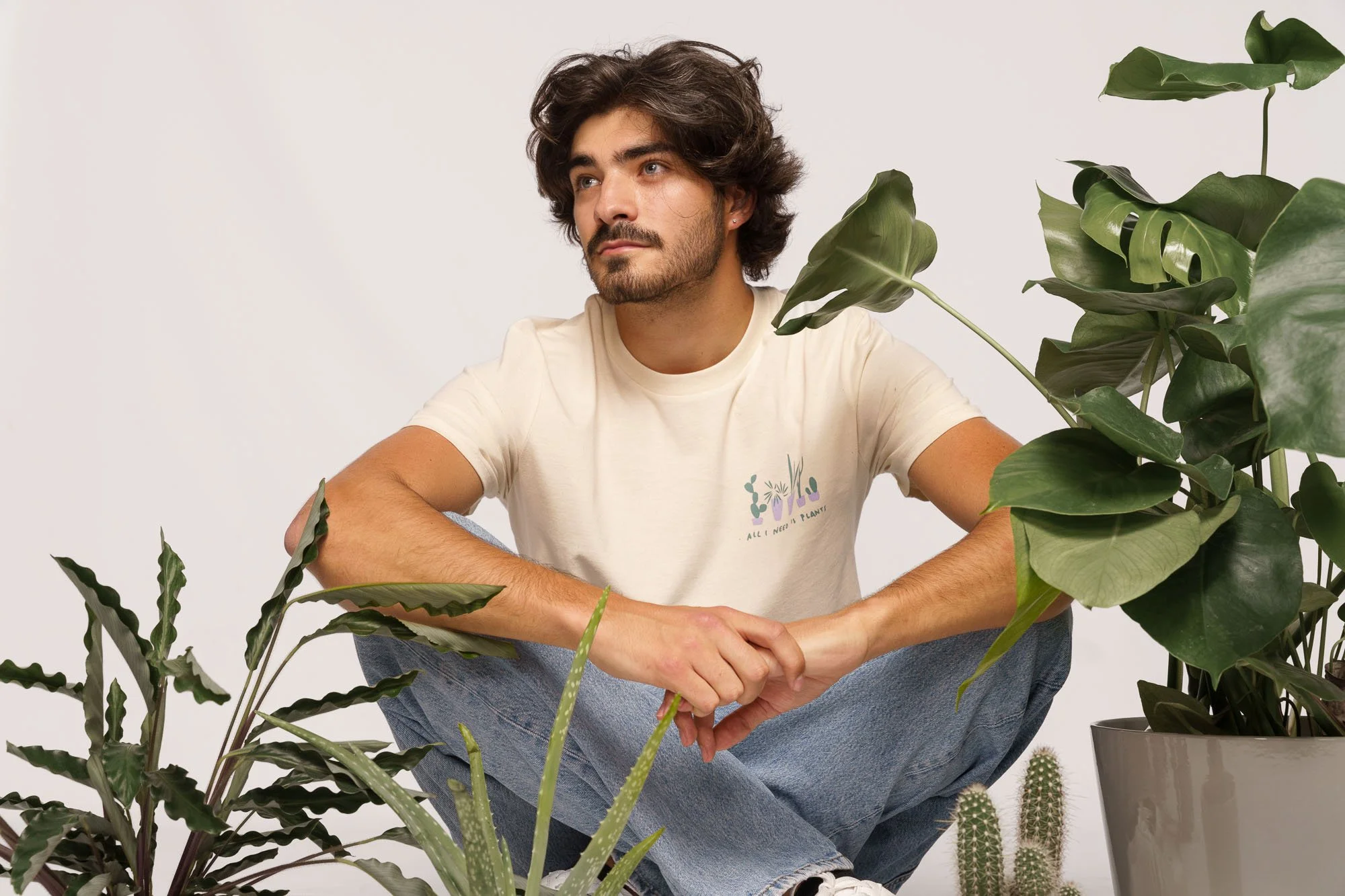 Man wearing Contrast organic cotton designer graphic tee All I Need Is Plants, sustainable minimalist streetwear