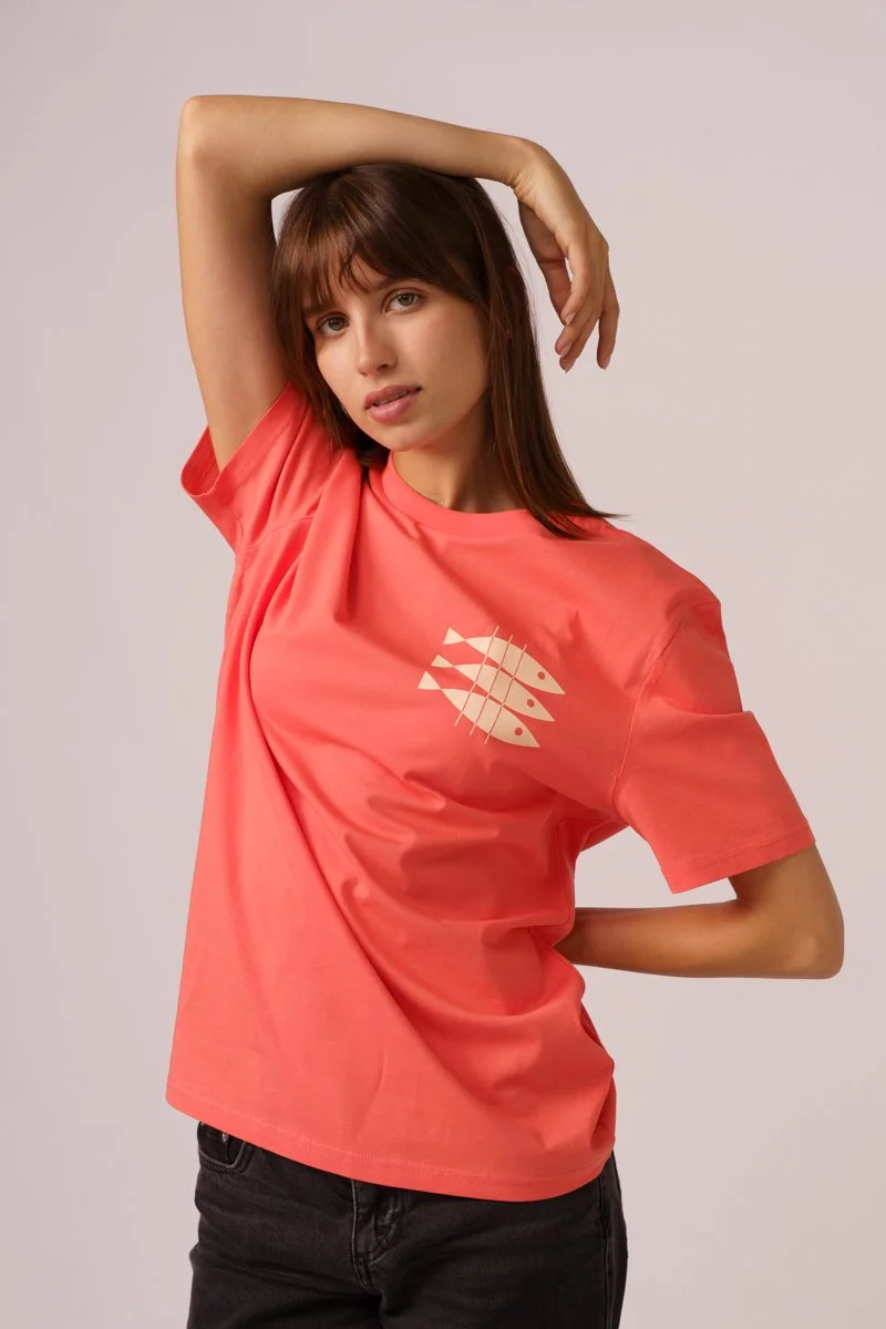 Contrast designer graphic tees collection featuring Sardines organic tee shirts in Fiesta Orange.