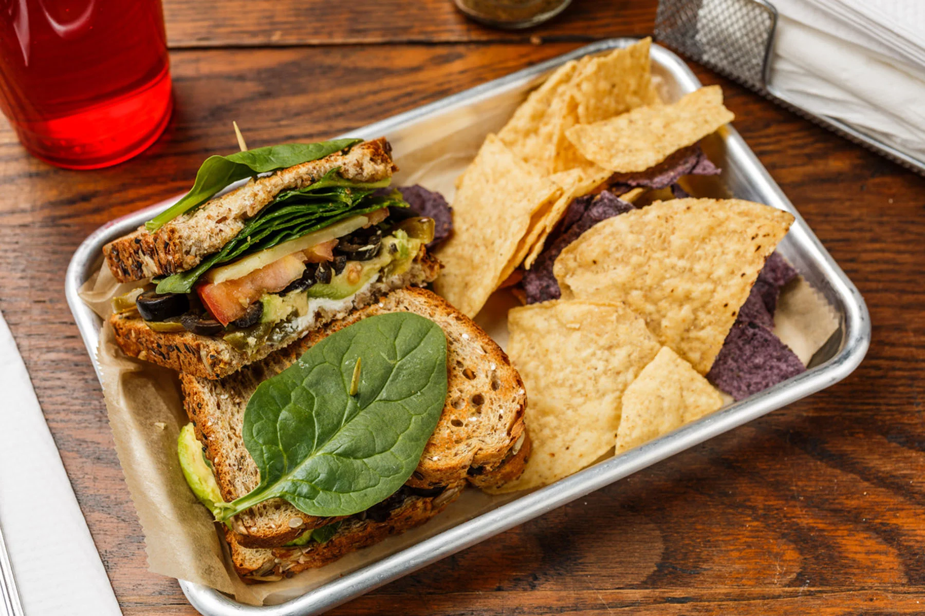 Hot Stuff Cream cheese, green onions, jalapeño, avocado, black olives, tomato, Monterey Jack cheese, spinach, mayo, and spike seasoning. Make into salad, sandwich, or wrap. $6.49
