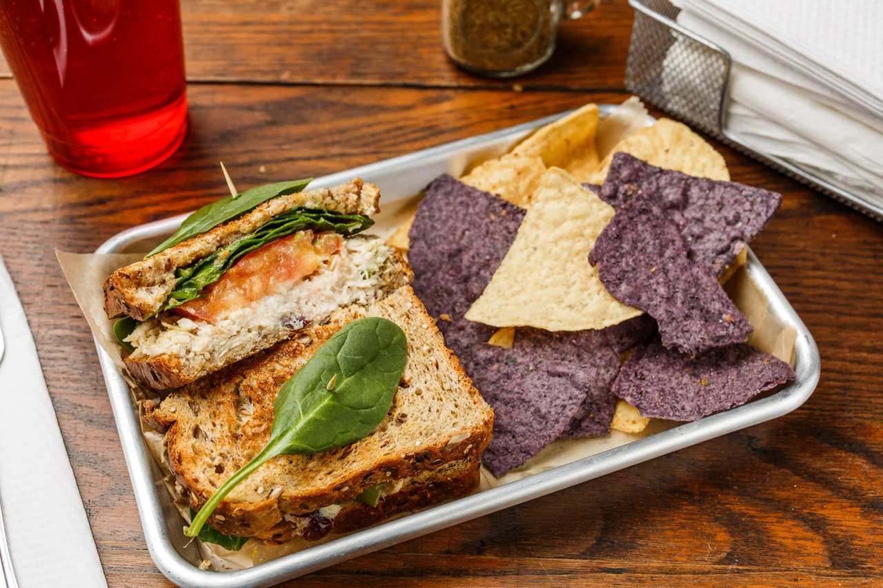 Foghorn Chicken salad, cranberries, tomato, spinach, and spike seasoning. Made as a wrap, sandwich, or salad. Served with organic tortilla chips. $7.49