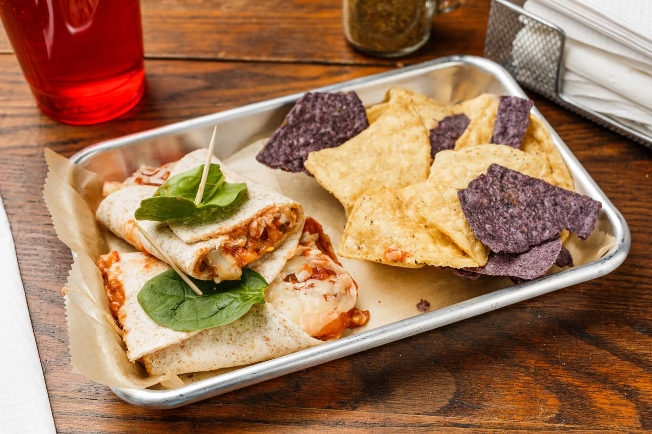 Bean Burrito Organic whole wheat tortilla, pinto beans, tomato, green onions, Monterey Jack cheese, and salsa. Served with organic tortilla chips. $5.49