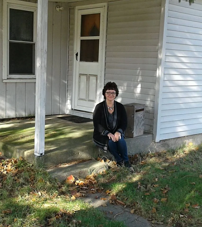 Beth Steury visits the site of the doorstep where she was found early one morning just after she was born. Photo courtesy of Beth Steury.
