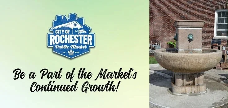 A sign for the City of Rochester Public Market with the message 'Be a Part of the Market's Continued Growth!' and a fountain against a brick building.