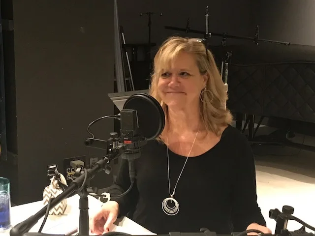 Dr Tammy smiling mic.jpg