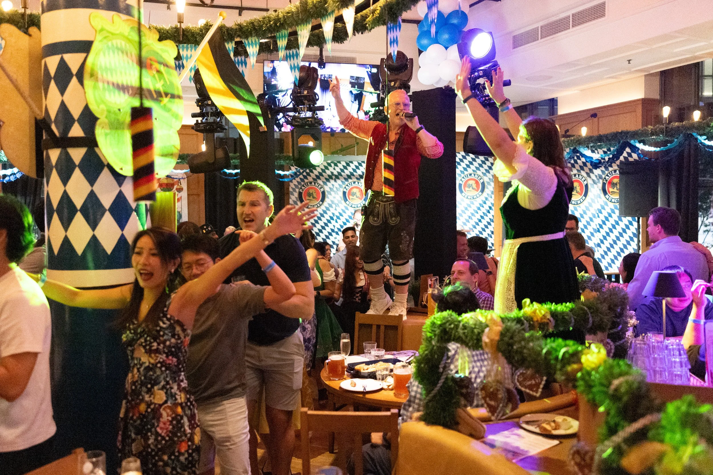  Live event audience and atmosphere during Oktoberfest celebrations at Paulaner Bräuhaus 