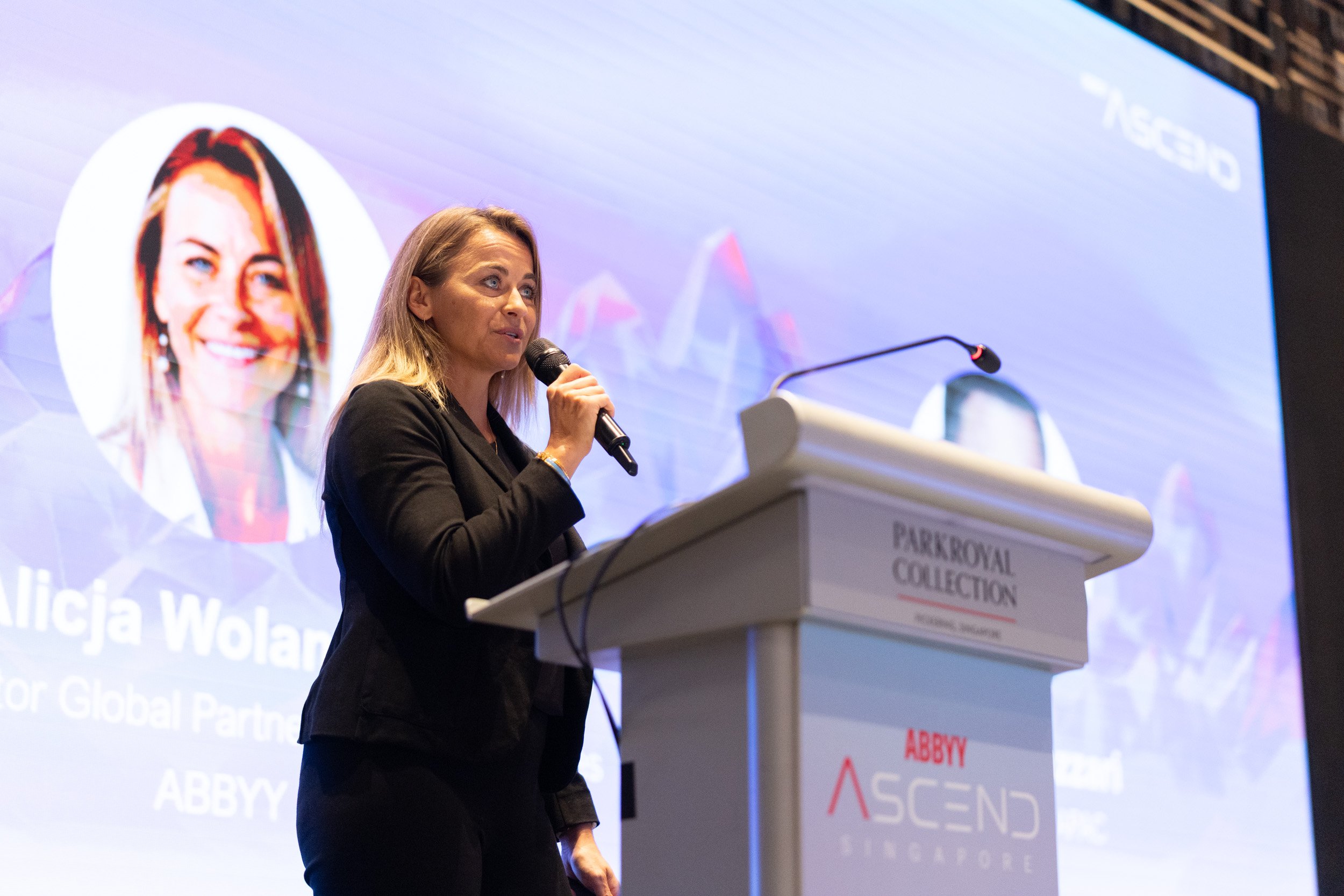  Speaker Alicja Wolanczyk giving a presentation during the ABBYY enterprise software seminar. 
