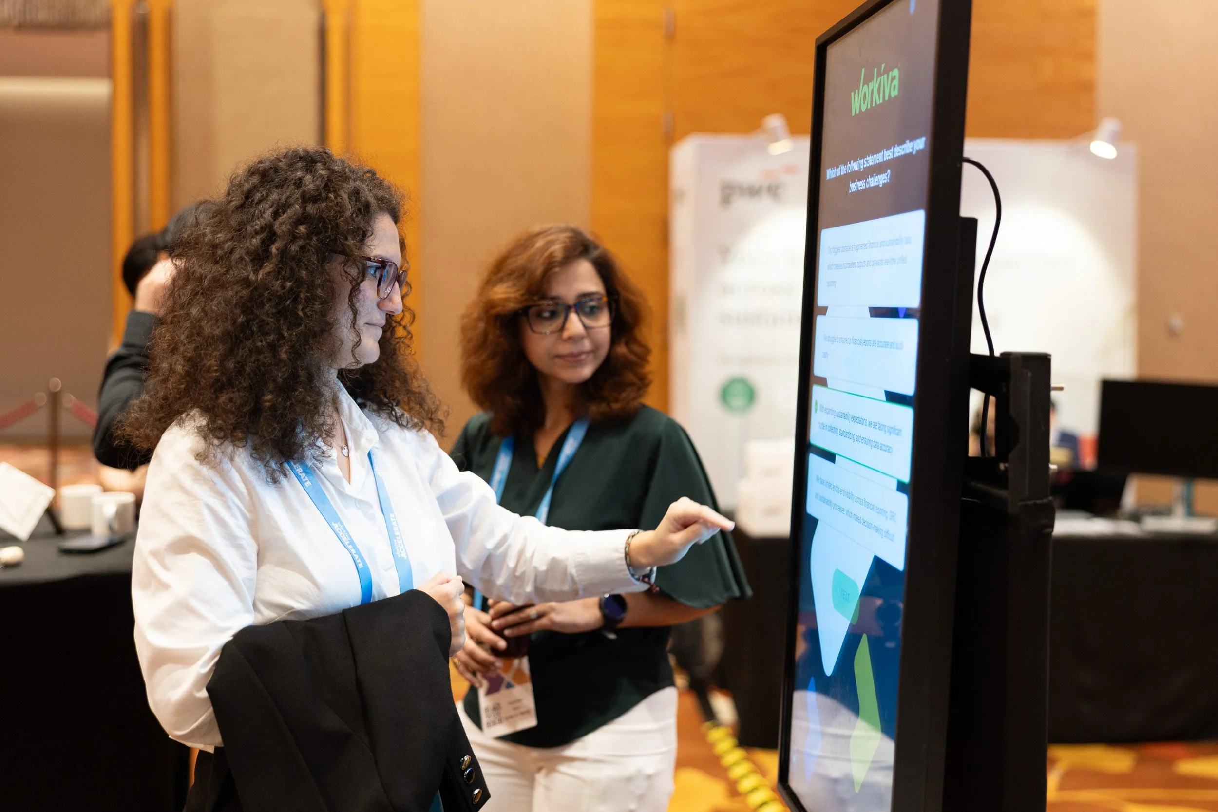  Conference guest using an interactive digital juice recommendation display at the event. 