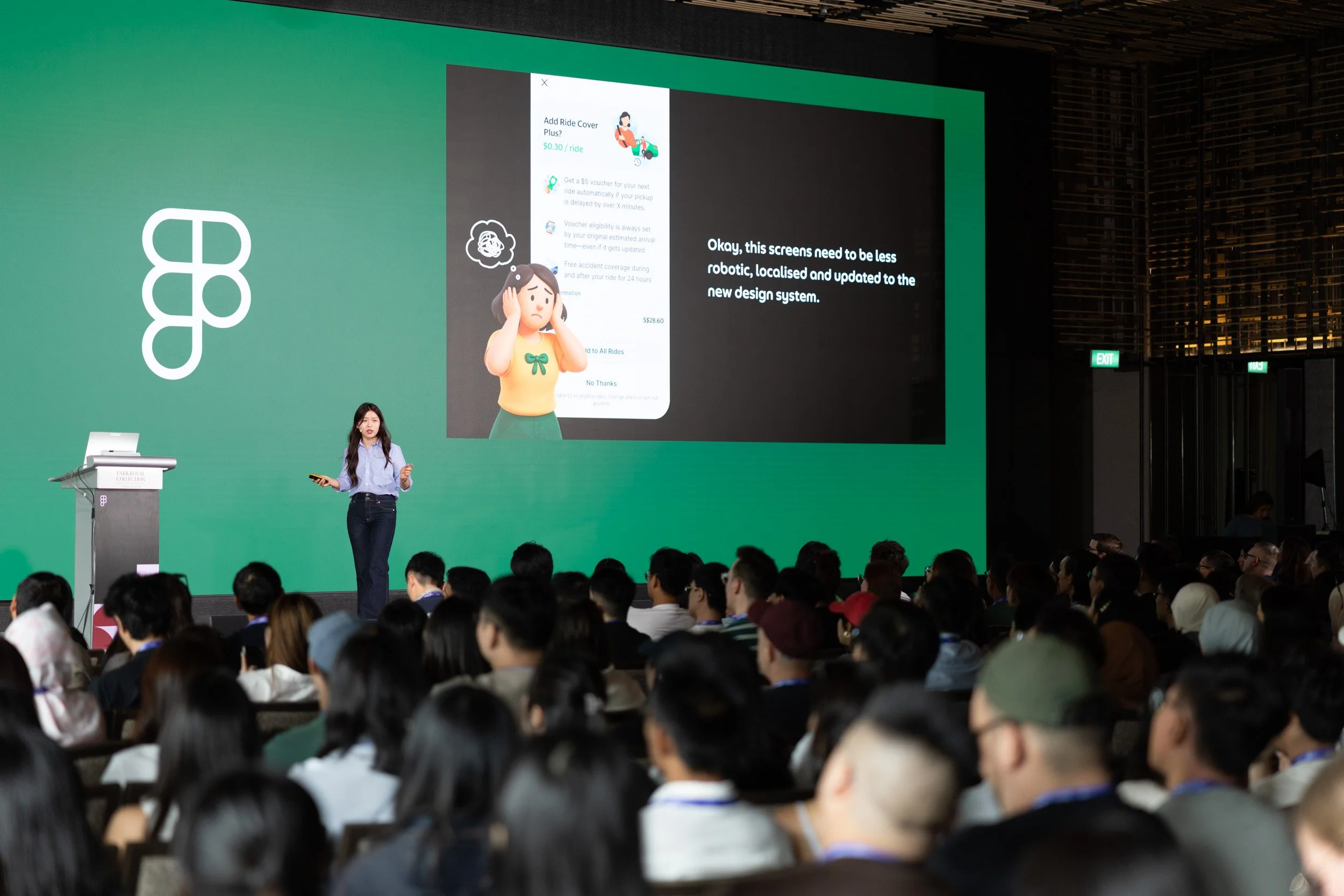  Presenter Victoria Jung speaking on stage during a Design Systems with Figma session. 
