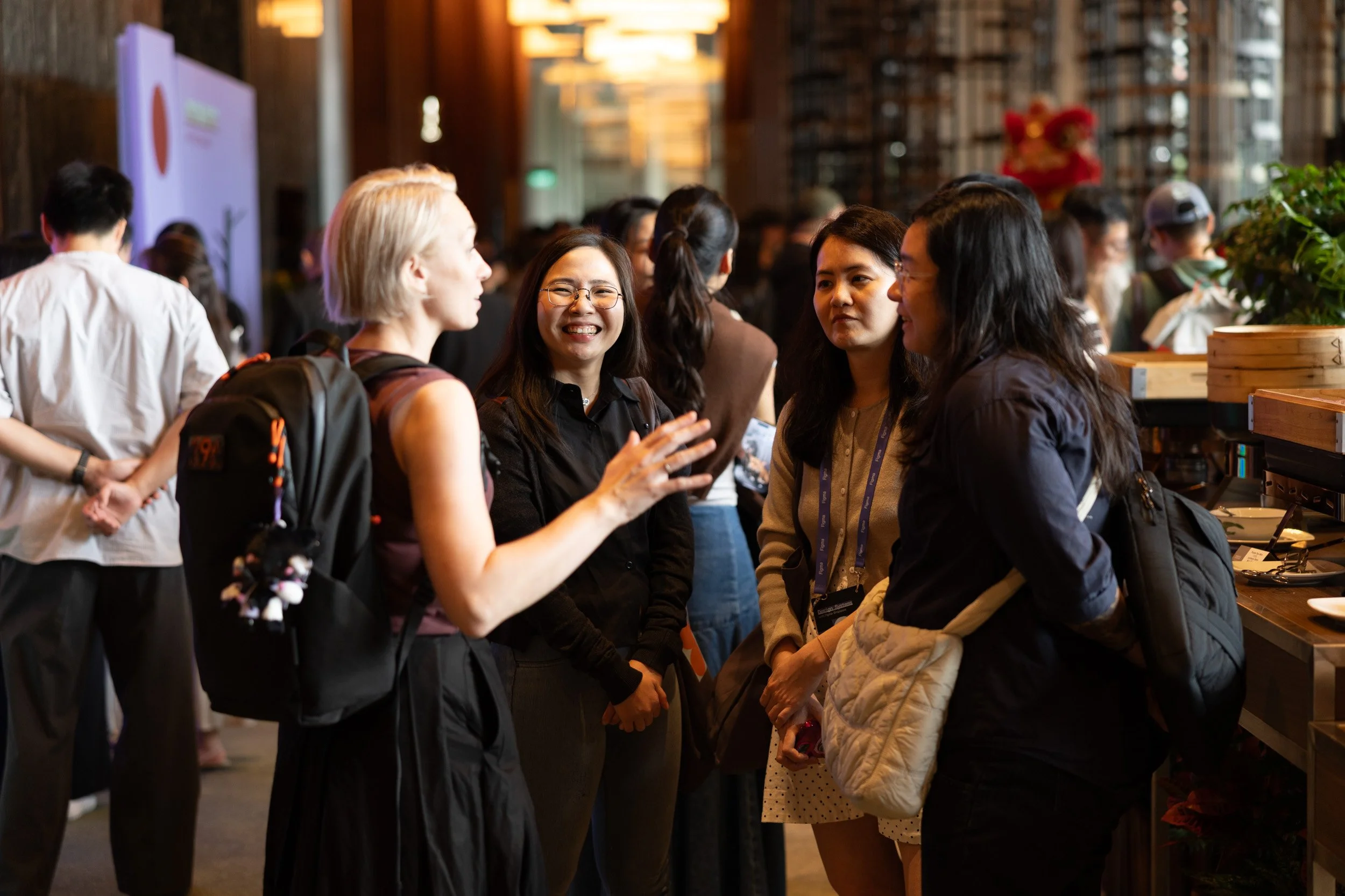  Mid range photo of design professionals networking. 