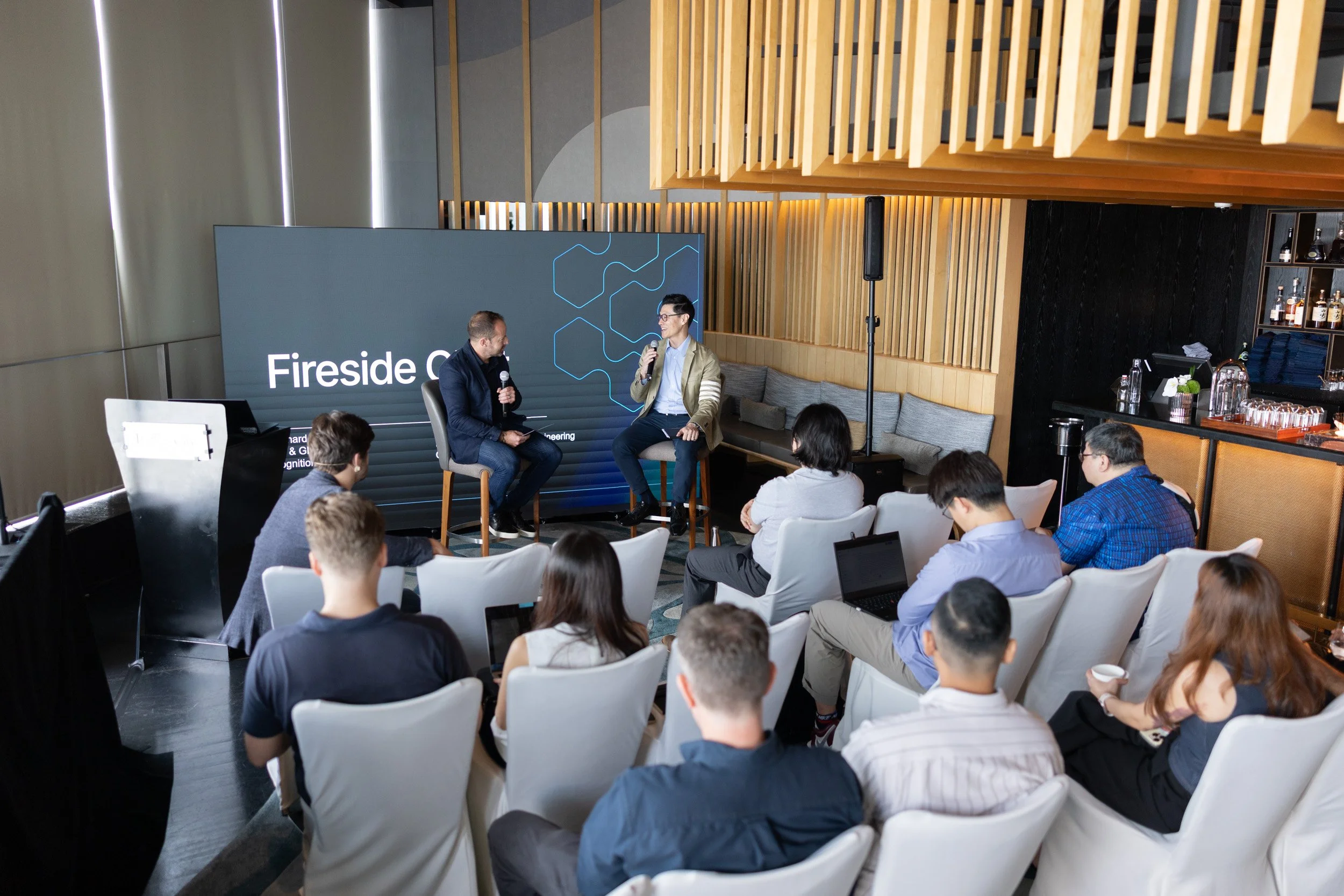  Wide angle stage photo of Michael Chung and Richard Spence during their joint presentation. 