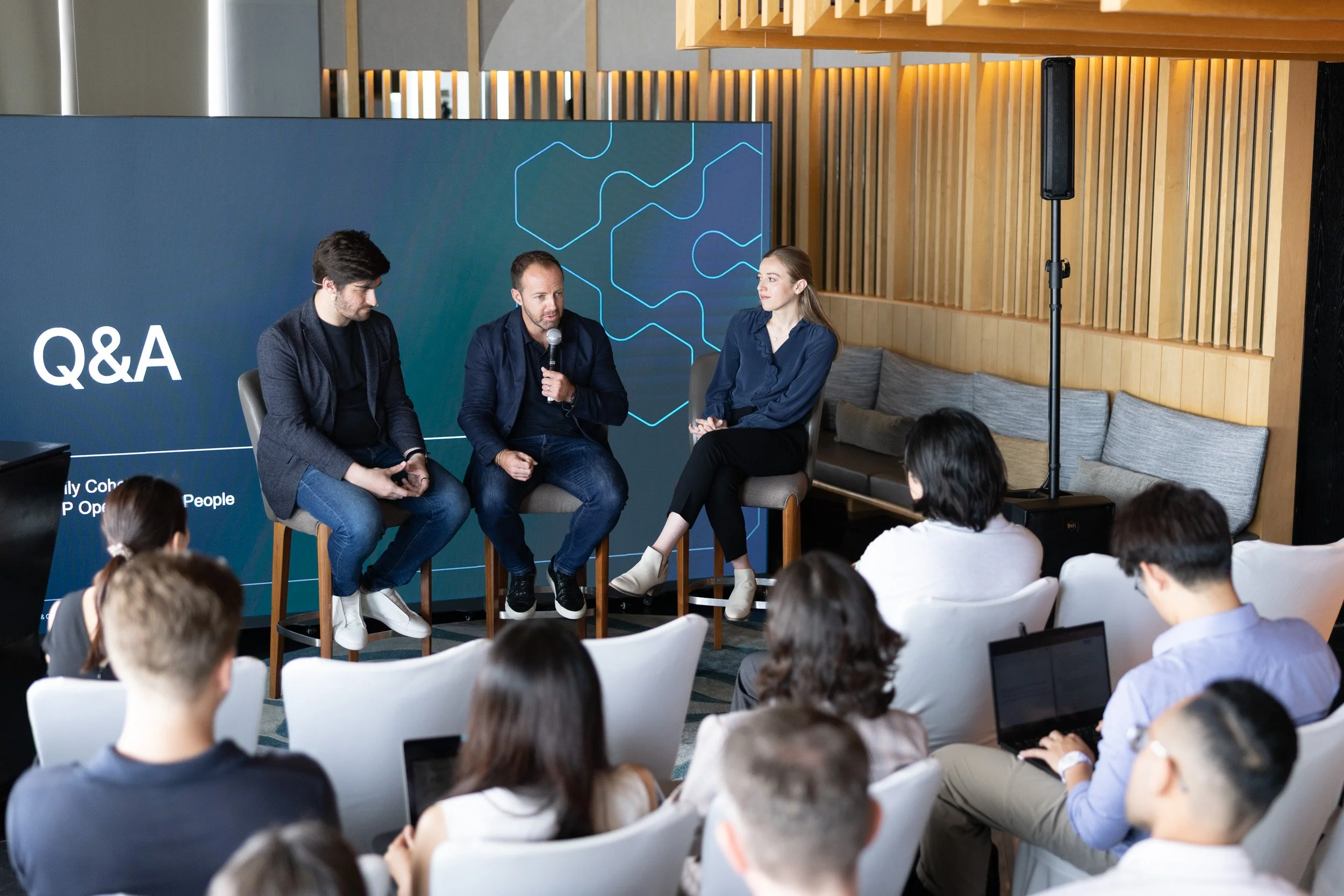  Panel panelist session featuring Emily Cohen, Richard Spence, and co-speakers during the Q&amp;A segment. 