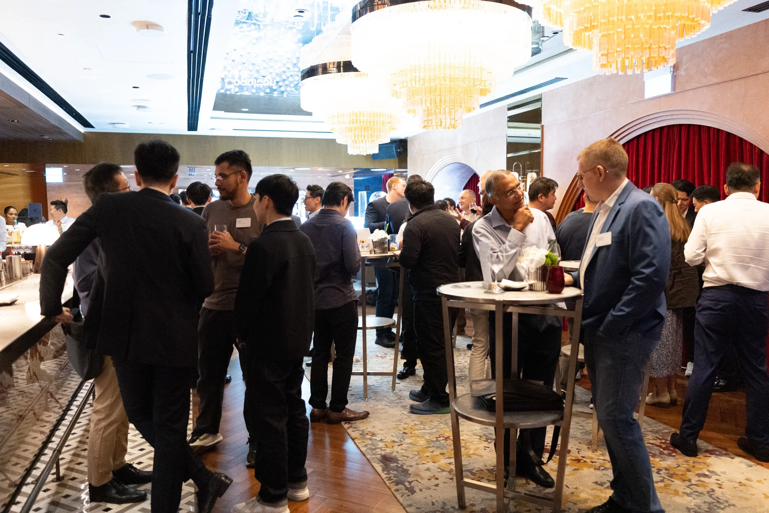  Wide angle event photography showing atmosphere and guest networking inside Anti:Dote bar. 