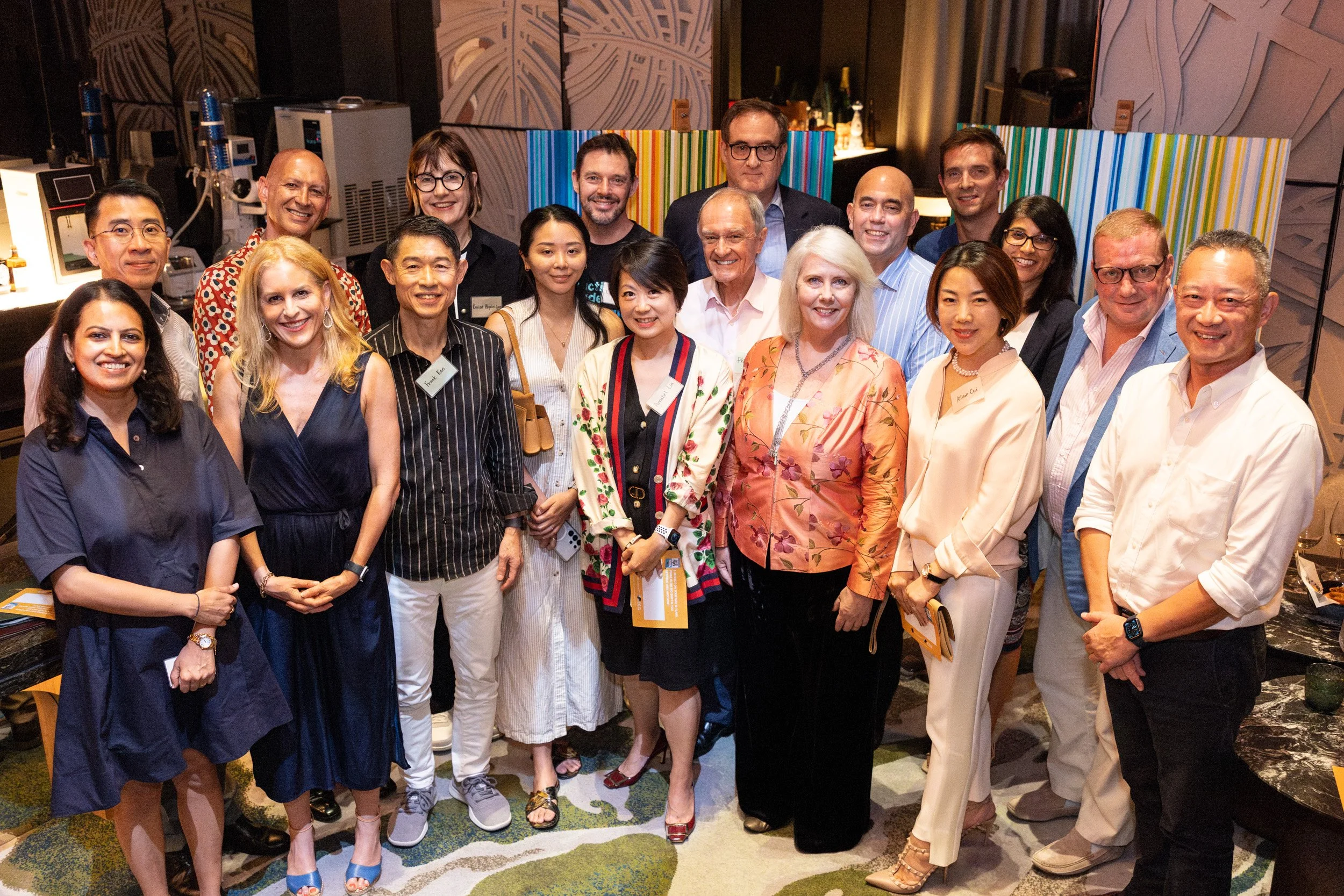  Commemorative group photo featuring Joanne Flinn, Annabel Lin, and event attendees at PLUME. 