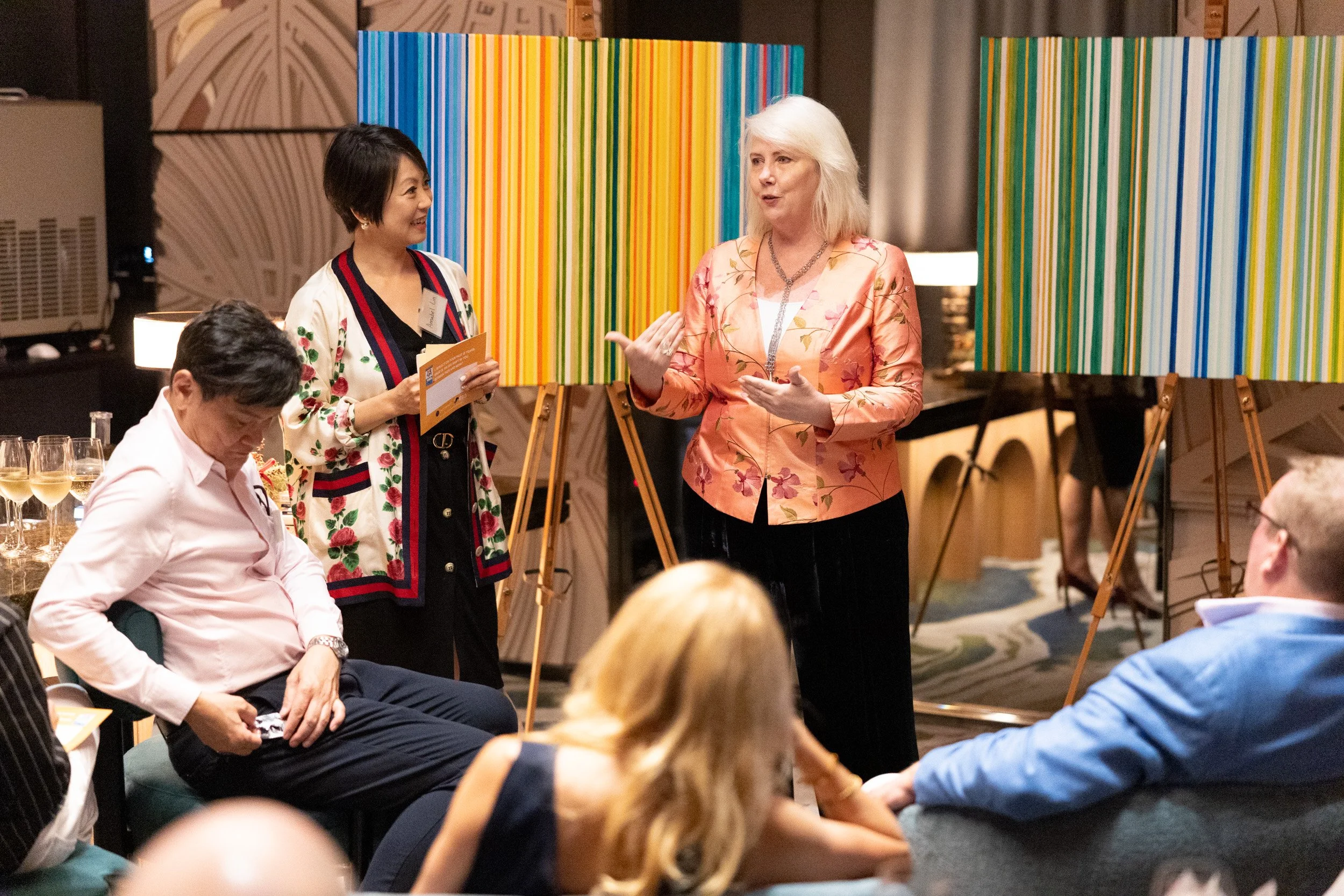  Close-up photograph of Joanne Flinn and Annabel Lin sharing remarks during The Change Leaders event. 