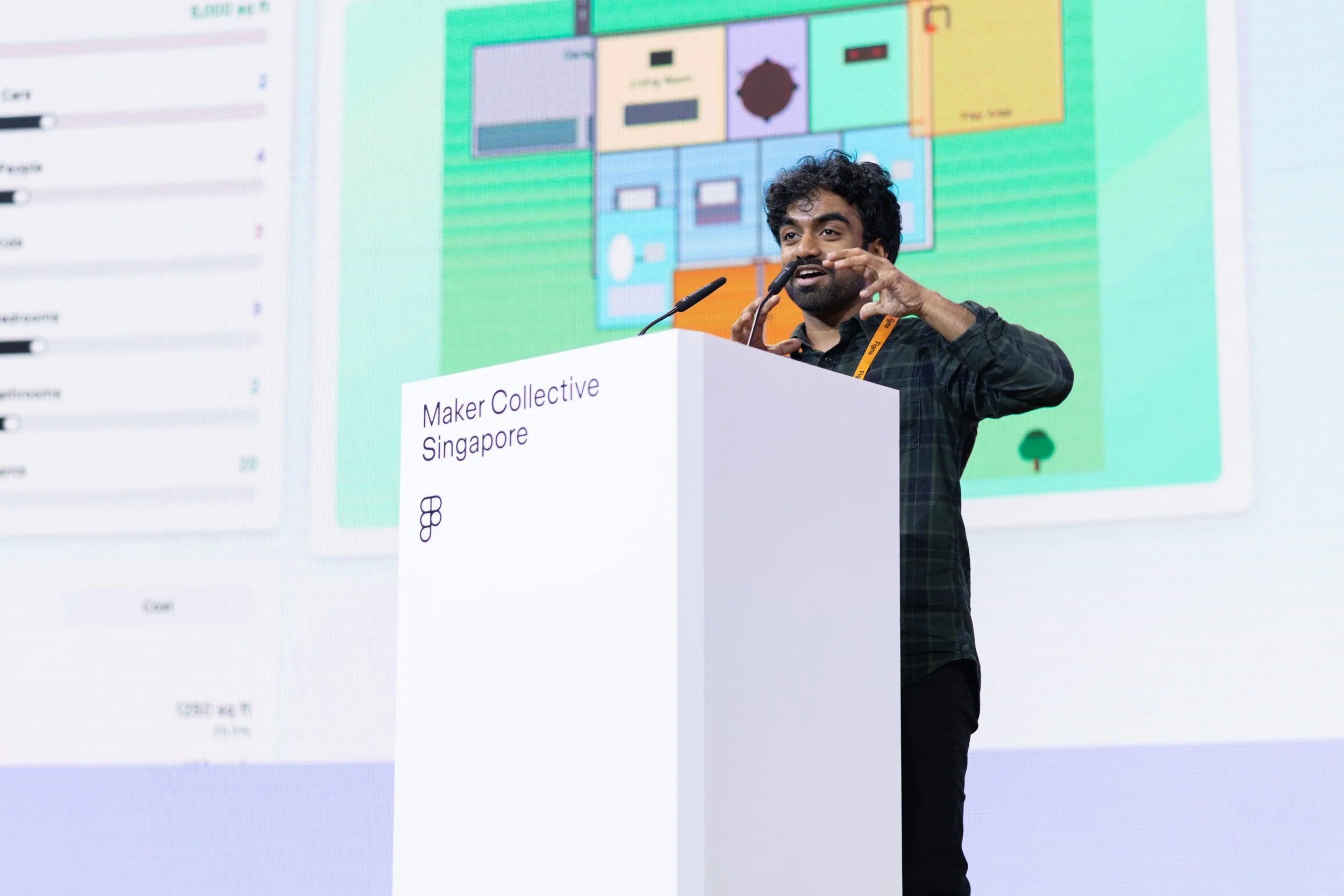  Close-up of a designer showcasing their interactive Figma prototype project to peers. 