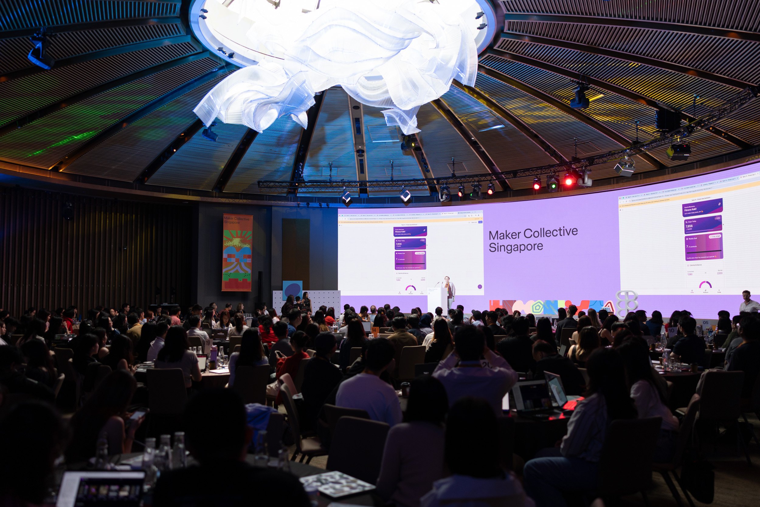  Wide view of a design community member demonstrating digital products built with Figma. 