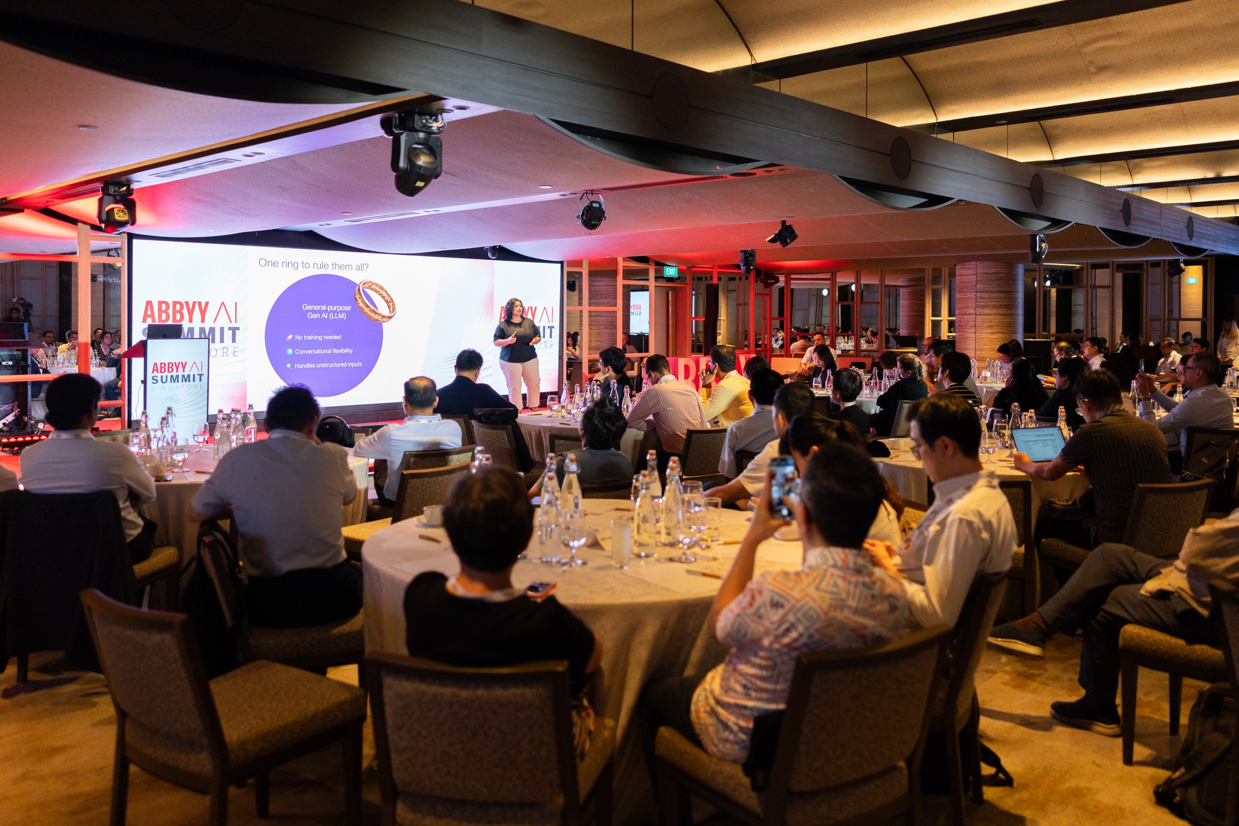  Wide angle stage photograph of Slavena Hristova delivering her keynote address at the ABBYY event. 